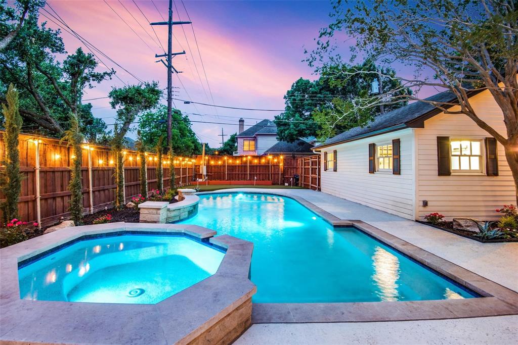 This beautifully renovated traditional residence boasts spacious, light-filled living areas with soaring ceilings and stunning light-finished wood floors throughout. A rare first-floor bedroom and bath currently serve as a den with a convenient wet bar. The gourmet kitchen features quartz countertops, double ovens, a gas cooktop, and ample cabinetry. The expansive primary suite includes a cozy fireplace and an ensuite bath with a walk-in closet. Step outside to the serene patio and enjoy a beautifully landscaped yard with a built-in pool. Situated on a corner lot in HPISD—Boone Elementary, with shopping and dining just minutes away!