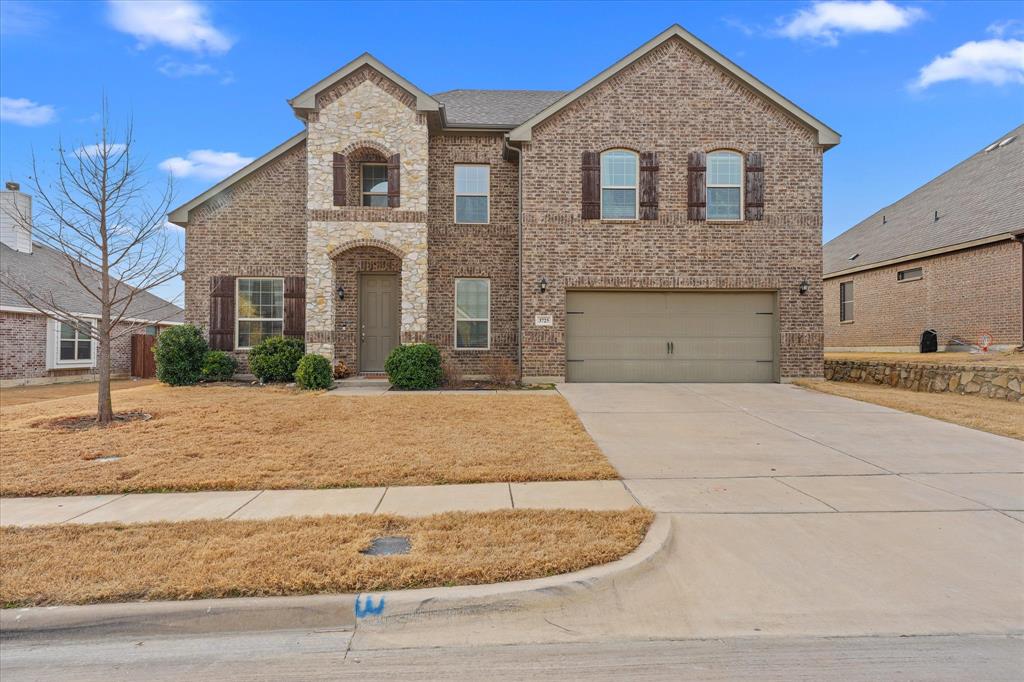Nestled in the heart of Krum, this 4 bed, 2.5 bath home offers over 3,000 square feet of space designed for connection, comfort, and everyday living. Step inside and you’re greeted by natural light beaming in your formal living room windows, creating the perfect gathering spot for holiday mornings, or lazy Sundays. Tucked away just enough for focus but close enough to stay connected, the home office makes working from home feel both productive and personal. The family room boasts a stunning wood burning fireplace, and ceilings towering overhead. The layout keeps everyone connected without sacrificing space, you can cook in the kitchen and still be part of the conversation in the living room. Step into the modern kitchen featuring stainless steel appliances, a grand island, and spacious walk-in pantry, there’s room for after-school snacks, big family dinners, and the occasional baking experiment. The dining space nearby makes weeknight meals feel intentional and celebrations feel easy. The primary suite is tucked away on the first floor, for privacy, offering a calm retreat at the end of the day with a spa like en-suite bathroom, and a walk in closet! Secondary bedrooms, located upstairs, are generously sized and flexible, perfect for kids, guests, or whatever your season of life calls for. Also upstairs find the perfect place for movie nights, or the kids escape, a loft style family room awaits. Out back, in your private fenced yard, you’ll find space to breathe, ideal for backyard barbecues, pets, playtime, or simply enjoying a quiet Texas evening. Add in the 2 car garage and thoughtful storage throughout, and this home truly supports busy family life. Located near Krum ISD, surrounding cities, and just minutes from I35, you get the comfort of a neighborhood setting with convenience close by. This isn’t just a house with good features, it’s a home where memories are waiting to be made.