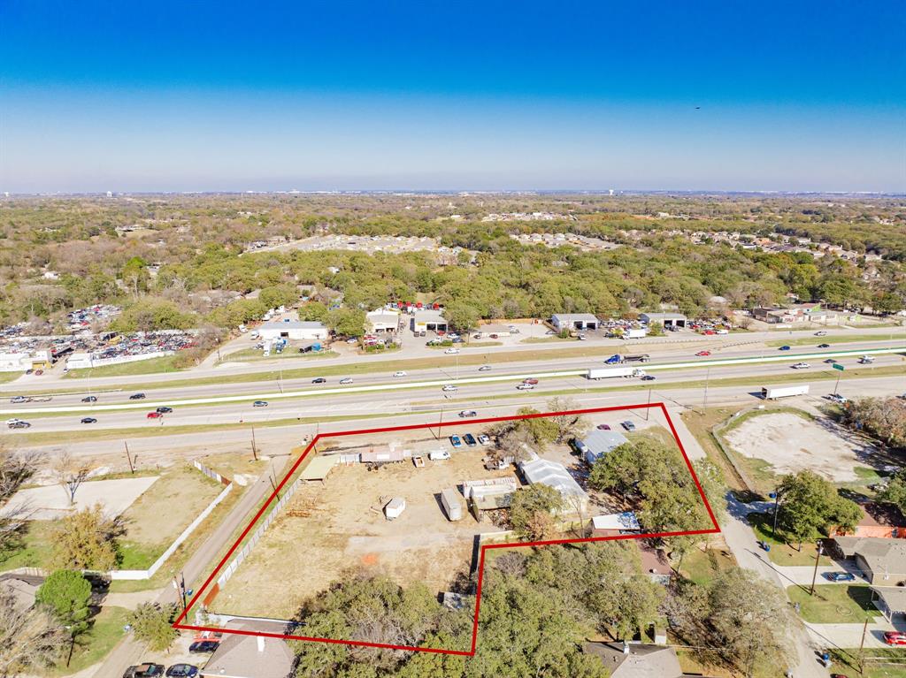 Positioned for maximum visibility and accessibility, this prime 1.36-acre commercial property offers outstanding highway frontage in a strategic location between Dallas and Kaufman. With quick access to I-20, 635, and Highway 175, commuting is convenient for employees and clients traveling from either direction. The fully fenced property features controlled access and added security with five installed surveillance cameras, making it an excellent opportunity for a variety of commercial uses.

Inside, you’ll find ample office space, a dedicated conference room, and a kitchen—perfect for team meetings and daily operations. The large workshop and abundant storage areas make this property a strong fit for service companies, contractors, logistics operations, or any business needing workspace and yard capacity.