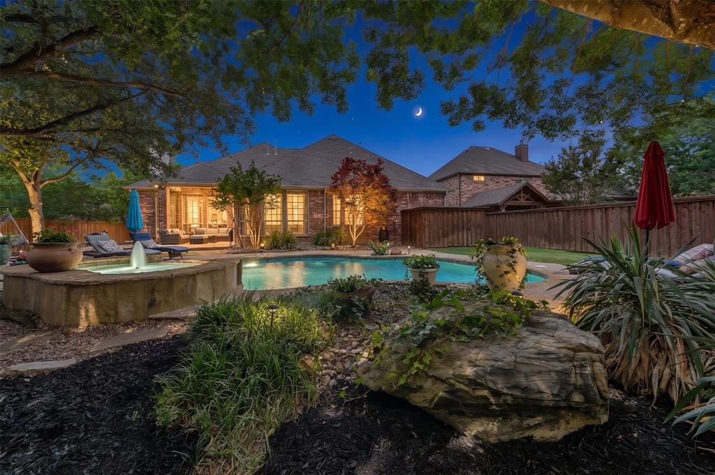 REDUCED $16,000!!! WOW! Magnificent McKinney Custom Home is the Perfect Floor Plan Providing PRIVACY FOR ALL! 2 Separate Master Suites (Primary Master overlooks Gorgeous Pool, Spa and Lusciously Landscaped Garden Of Eden Backyard! 2nd Master Suite for In Laws, Guests or Students home from college! Separate Outdoor Living Area Invites Everyone to Congregate and Enjoy an outdoor cookout and hours of Having Fun in the Sun! Gourmet Kitchen is The DREAM of Every Gourmet Chef! Huge Island for Gathering around while The Chef performs their MAGIC! Granite Countertops, Gas Cooktop (A Must!) Huge walk in Pantry, Ceramic Tile Flooring. OPEN LIVING-DEN overlooks Outdoor MECCA accenting by Wonderful Builtin and Fireplace! High Ceilings, Plantation Shutters and so much MORE! The OVERSIZED upstairs GAME ROOM with Private Bathroom is the Ultimate Hideaway for hours of Gaming Fun or Streaming your Favorite Movies! If you LOVE your CAR, the Showcase Garage with Special Lighting is a Must See and Must Have! This  Home is THE ONE You've been looking for if you LOVE TO ENTERTAIN! A ROYAL TREASURE Fit for Any Member of The Family! Don't Miss a Your Chance to Make This Heaven On Earth your next Destination! (3rd Car Garage has a Tornado Shelter!!!) WOW!!!