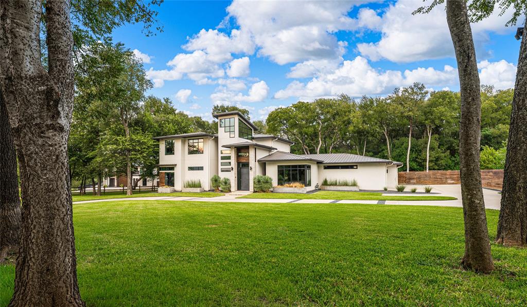 Set in the treasured Cameron Park neighborhood, this standout, former Parade of Homes residence showcases avant garde design, distinctive style, and duende rarely found in Central Texas.  Carefully curated by its single, well traveled owner; the home was commissioned without concern for cost with a single mandate: intrigue.   ~   Four bedrooms, an office, and three bathrooms across nearly 3,400 square feet are highlighted by the home's soaring ceilings, walls of glass, and fantastically open floorplan.  Conjuring an inviting, welcoming atmosphere that's light, airy, and spacious while still soliciting high drama, each room is intentional and defined in its purpose yet seemingly integrated in the adjoining space.  Few homes so seamlessly merge spaces, yielding an ultimate flexibility without feeling messy or worse, as if the home is just one, big, giant box.   ~   Here, instead, each space is framed by an architectural element that's as subtle as it is sophisticated: the peak of the pool past the firepit, magnificent fireplace mantle, book matched cabinetry, and chic fixtures all play in concert to envelope the entrant in a serene calm that's curious if not inspired.  The main floor hosts two bathrooms, an office, and the primary suite; thus requiring no other accommodation by most.  Upstairs, three bedrooms and a bathroom round out guest, gym, or media space possibilities with stellar views and similarly stylish settings.   ~   Outside, the half acre (plus) lot is tidy and private.  Just steps from the best hiking and biking trails in Texas, this prized proximity to Cameron Park is worth the asking price alone.  A short drive to Baylor University and downtown Waco ensure that there's no place more desirable in all of Wacotown.   ~   A true 'one of one', this is an exceptionally unique opportunity to acquire a distinctive property well below the cost of duplication.   ~   Interested?  Immediate inquiry is advised.