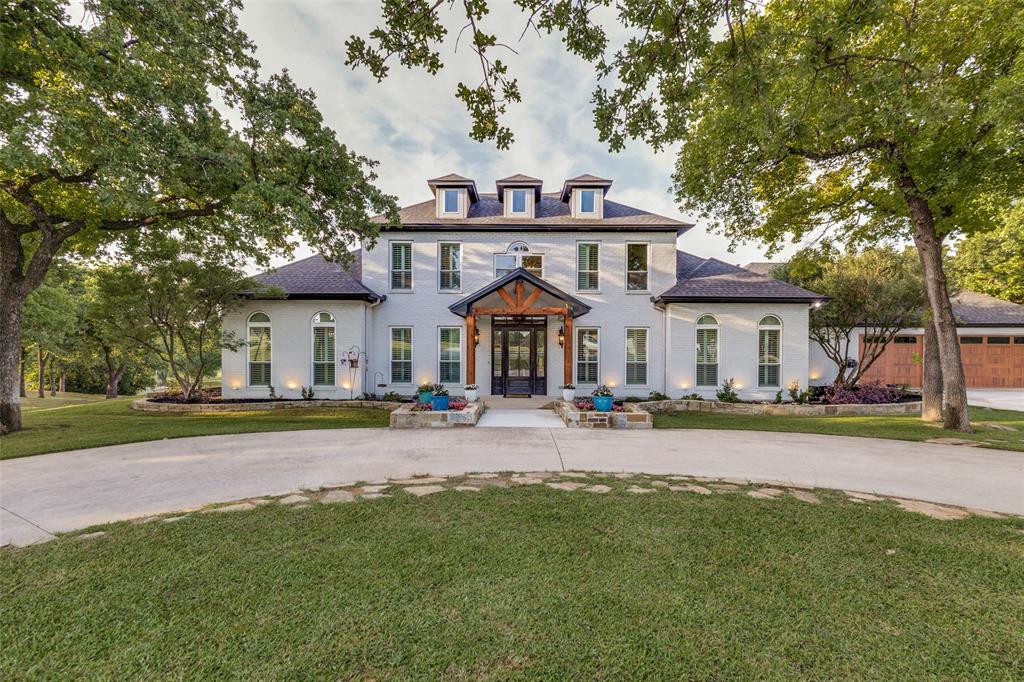 H3 Ranch, a premier 276.87 acre equestrian and recreational property in Wise County, Texas. Combining luxury improvements, outstanding horse facilities, abundant water, diverse wildlife, and breathtaking scenery, this is a rare opportunity to own one of North Texas' most impressive ranches. Beautifully remodeled 4,600 sqft home featuring 4 brs, 4.5 ba, spacious living areas, and high end finishes throughout. Large windows capture stunning views of the pool, arena, and surrounding countryside, creating the perfect balance of luxury and ranch living. Ranch features a 125x275 lighted arena with a walker, 75x100 eight stall barn with covered runs, and an office overlooking the arena and ranch. 30x60 insulated equipment shop and several covered parking areas. The land itself is truly remarkable. With more than 100 feet of elevation change, the ranch offers rolling hills, scenic overlooks, wooded creek bottoms, lush pastureland, and panoramic views in every direction. Mature oak, pecan, and native hardwood trees enhance both the beauty of the property and the wildlife habitat. Water is one of the defining features of H3 Ranch. Over 4,400 feet of Big Sandy Creek winds through the property, creating a stunning natural corridor and providing excellent wildlife habitat. Five stocked ponds, several of which are spring fed, are strategically located throughout the ranch and offer outstanding fishing opportunities while providing dependable water sources for wildlife and livestock. The ranch supports an abundance of native wildlife including whitetail deer, Rio Grande turkey, ducks, and hogs. Properties offering this level of improvement, water, topography, and recreational appeal are increasingly difficult to find. H3 Ranch presents a rare opportunity to own a turnkey North Texas ranch that excels as an equestrian property, recreational retreat, family legacy ranch, or investment. Experience the beauty, privacy, and versatility of one of Wise County's finest ranches.