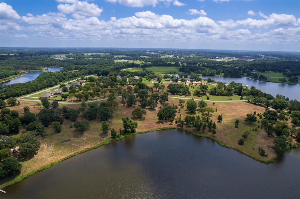 Rare opportunity for waterfront on a quiet lake with beautiful views in a spacious neighborhood! Nestled on Lake Tankersley in Northeast, Texas, this attractive, gently-sloped 1+ acre property has access to 116 feet of shoreline. Carolina Way is a new subdivision offering oversized lots, making it the perfect place to spread out & build your dream home. While it is tucked away in a peaceful lake retreat, the conveniences of town are not far away, including shopping, dining, and healthcare. Come fish, relax and stay a while...waterfront lots are limited so give us a call today!