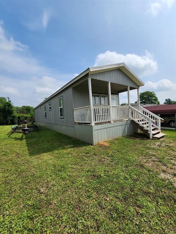 Now is the perfect time to secure your lake home before summer arrives! This charming 2-bedroom, 2-bath home sits on a low-maintenance 0.13-acre lot, making it ideal for easy living. This little Gem has plenty of room inside! Located in a secure gated community, you’ll enjoy fantastic amenities including a pool, dock, playground, boat ramp, and convenient access for fishing anytime you like. Check out Holiday Villages Online,there is so much available!  This is also a great place to live day to day!  Priced Right, Built Right! Good for a college student, not far to TJC! 

Nestled in a clean, quiet neighborhood, this approximately 990 sq. ft. home is about four years old and in excellent condition. It features a handicap-accessible ramp and a relaxing front porch—perfect for enjoying peaceful mornings or evening sunsets.  This is the easy life. Cheaper than apartment living! 

Situated in beautiful East Texas, this property offers the perfect escape from the hustle and bustle. It’s an ideal gathering place for holidays and special occasions with friends and family—or simply a wonderful place to call home year-round. With minimal upkeep required and plenty of nearby shopping and attractions in surrounding towns, you’ll have the best of both relaxation and convenience.

This could also be a great investment into the B&B world. This is a great fishing lake with tournaments often!!  Come take a look!