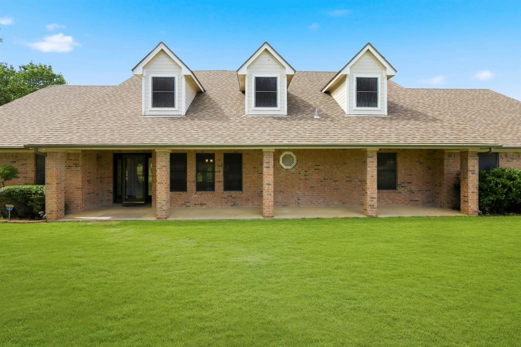 Nestled on over 1 acre in Haslet, this well-maintained 3-bedroom, 2-bath home offers space, privacy, and a functional single-story layout. The home features over 2,000 square feet with a spacious living room, dedicated dining area, breakfast nook, and a well-appointed kitchen with granite countertops, center island, pantry, and abundant cabinet space. The primary suite includes a large bedroom, walk-in closet, dual sinks, separate shower, and soaking tub. Two additional bedrooms are positioned on the opposite side of the home, offering a practical split-bedroom layout. The oversized laundry room adds extra convenience and storage. Outside, enjoy mature trees, a large grassy yard, covered patio space, long driveway, and plenty of room for outdoor living, gardening, pets, or future improvements. Located within the Extraterritorial Jurisdiction (ETJ), the property may offer greater flexibility and fewer municipal restrictions than properties located within city limits, making it appealing for those seeking additional freedom in how they use their property. Buyers should verify any intended use with the appropriate authorities. Conveniently located near major highways, shopping, dining, and Alliance-area amenities while still offering the freedom and privacy of a larger homesite.