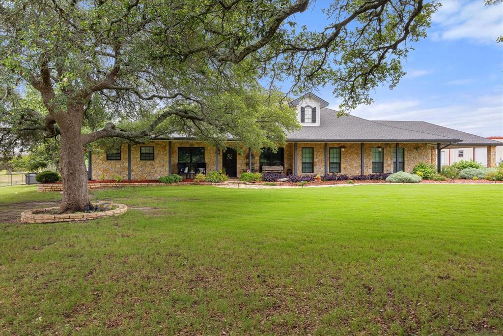 This spectacular gated estate offers the perfect blend of luxury living and recreational paradise on 24+ pristine acres. Built in 2002, completely updated in 2018, residence combines elegant design with modern amenities, creating an unparalleled lifestyle opportunity. Home has 6 Bedrooms, 5.5 Bathrooms, 4,250 Square Feet of thoughtfully designed 2 living spaces, 2 dining spaces plus an office. A Screened Porch for comfortable outdoor relaxation and a Attached 2-Car Carport 25 x 13. Outside you'll find a Pool House Outdoor Kitchen featuring a built-in grill, griddle, sink and bar seating. Enjoy endless family fun in the sparkling pool with slide, hot tub and stone fire pit with seating. The property features a Majestic 300-Year-Old Oak tree, gated entrance for privacy and security, paved driveway, pond, and manicured landscaping. There is a building with over 3300 sqft that is divided by 15x13 storage room, climate controlled 20x40 gym space, two 30x40 storage workshop spaces with electricity. Attached covered 50x13 Motorhome and RV parking and a 1 car carport space. There is also a stable, garden shed and playhouse on the property. Underground storm shelter off the side of the house.
