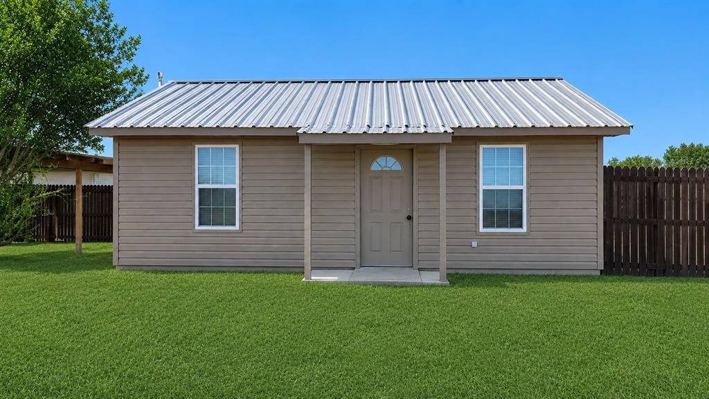 Cozy 2 bedroom, 1 bath home with 638 sq. ft. tucked away on a quiet dead-end road. Sitting on a roomy .265-acre lot, this place is a great opportunity for a first-time buyer. Large privacy-fenced backyard, a few mature trees, plus well and septic already in place. Nice, simple living with plenty of potential.