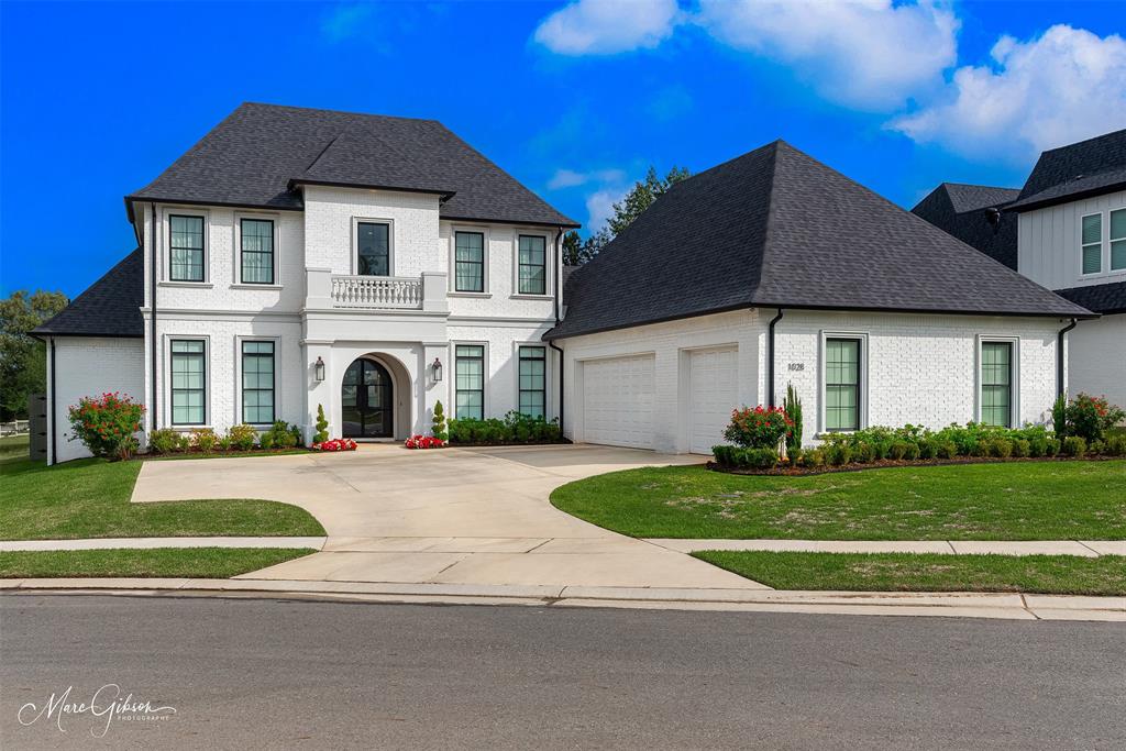 Located in the highly sought-after Southern Trace Golf Club community, this beautifully designed 4-bedroom, 4-bathroom two-story home offers the perfect blend of comfort, style, and functionality. Thoughtfully laid out with two bedrooms downstairs and two bedrooms upstairs, each spacious bedroom features its own private bathroom—ideal for both everyday living and hosting guests.

The open-concept floor plan creates a seamless flow throughout the main living spaces, centered around a stunning chef’s kitchen with a large quartz island, gas range and oven, and ample room for gathering and entertaining. The expansive living and dining areas are filled with natural light and designed for both relaxed living and elegant entertaining.

The private primary suite offers a luxurious retreat with a spa-like en suite bath, highlighted by an oversized walk-in shower and generous space to unwind. A dedicated home office provides the perfect setup for remote work or study, while the separate workout room adds flexibility for fitness, hobbies, or additional bonus space. 

This home combines upscale living with a desirable floor plan in one of the area’s premier neighborhoods.