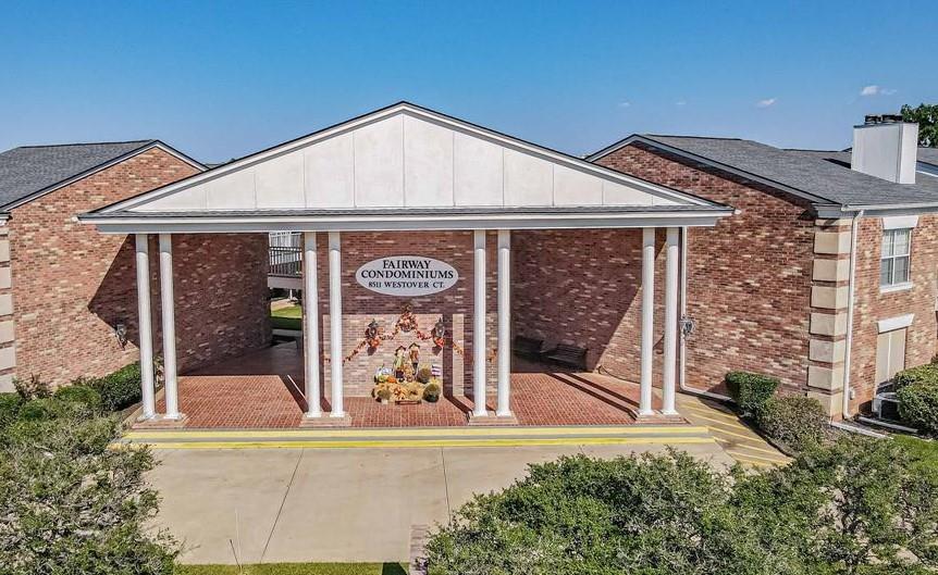 TASTEFULLY REMODELED AND UPDATED first floor condo with double patio and view of pool. Conveniently located near parking area and your own golf cart garage or storage area. Prepare to be impressed. Step inside to discover a freshly painted and modernized, open concept condo. Beautiful hardwood floors throughout except for tile baths. Exquisite chandeliers and numerous canned lights brighten the entire kitchen and living area. Custom finishes, such as triple crown molding and custom baseboards, add a touch of elegance at every turn. Kitchen boasts pretty white custom cabinets with solid and glass doors (lighted) and open shelving, under counter lighting, slide out spice racks, top-tier granite, 3-D subway tile backsplash, custom range hood, built-in wine cooler, stainless appliances and farmhouse sink and new faucet. SS Kitchen-Aid appliances Super-wide counter extends into dining area with room for four bar stools. Handsome Austin stone fireplace with custom trim surrounds and adjacent built-in shelves for books, photos and ornamentals. Living room and primary bedroom have access to patio; plantation shutters on doors. Primary bath features separate shower, granite countertop and two sinks. Guest bath has granite counter and a classy vessel sink. New toilets and light fixtures in bathrooms. Unit has one covered and one uncovered parking space. Golf cart garage has an automatic opener that can be accessed with keypad or remote. Perfect downsize home or weekend getaway. Walking distance to clubhouse.
Come enjoy the amenities of this unique golfing community, with 2 golf courses, marina, campgrounds, 2 swimming pools, country club, dog park, tennis, stables and more! Top notch VFD & 24-7 EMS. Minutes from lake and historic downtown Granbury square with quaint shops, restaurants, art and cultural events, festivals, and weekend activities. An hour from Ft. Worth.