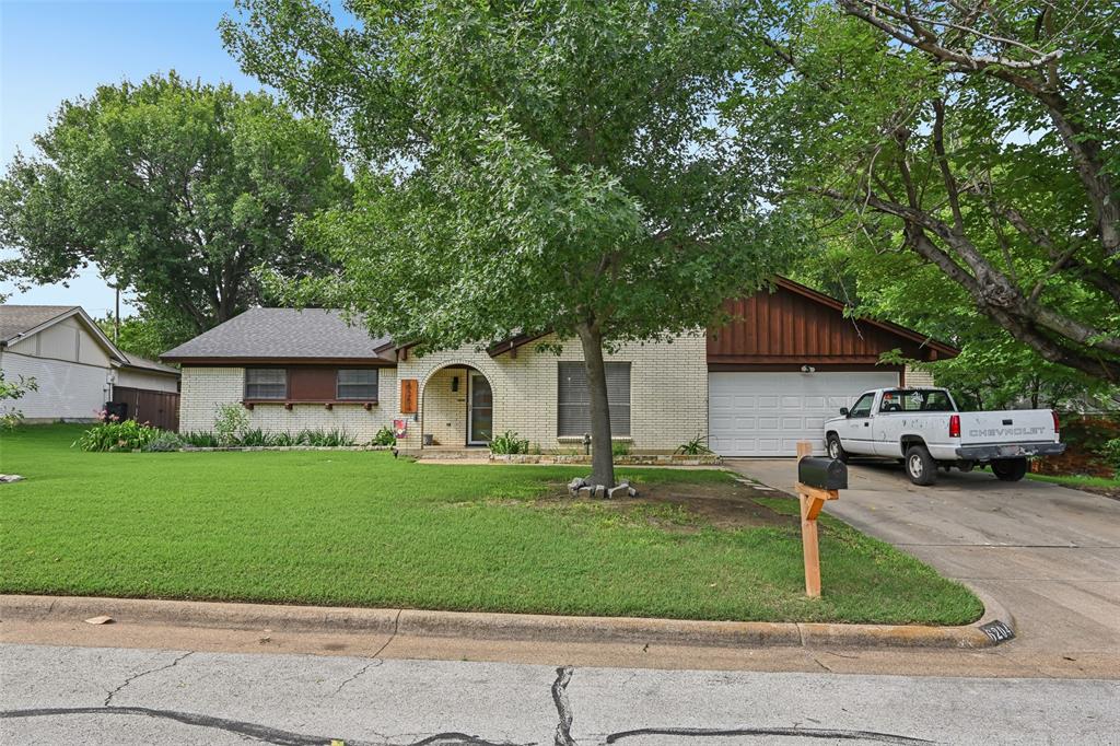 The owners have spent the last few months getting this home ready for you to move into... A tastefully updated mid-century modern home with 3 bedrooms, 2 full bathrooms, 2 living and 2 dining areas.  Roof replaced 2023. The combination living & dining room was remodeled in 2020 including adding French doors, crown molding & engineered wood flooring. This room can also be used for a home office.   Baseboards replaced in the living & dining rooms and entry way. Blinds, plumbing fixtures, light fixtures, & ceiling fans replaced. Interior painted.  Kitchen updated with smooth electric cooktop and vent hood. Enjoy the beautiful Texas weather with a covered patio with a reclaimed tin roof.   More areas for outdoor living include a uncovered deck, patio and firepit.  Wood on the exterior repaired and painted.   Wood fence with metal posts.  Private backyard.  Walking distance to the JoAnn Johnson Trail (hiking and biking).   2 miles from North Richland Hills TexRail train depot (park and ride to Fort Worth, Grapevine, and the DFW airport).  Birdville ISD.