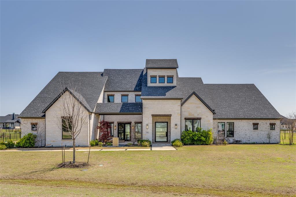Exquisite J. Anthony Home with Stunning Design and Backyard Oasis!
Discover unparalleled luxury in this meticulously designed 1.5-story home by renowned builder J. Anthony. Nestled on a prime corner lot in the highly sought-after Lovejoy ISD, this home offers an exceptional floor plan with thoughtful details throughout.
Step inside to spacious elegance, where soaring ceilings, premium finishes, and an open-concept design create an inviting atmosphere. The main level features a lavish master suite with a hidden room inside the primary closet, four additional bedrooms, a private study, a theater room, a game room, and a dedicated workout room. Upstairs, you'll find a secluded guest retreat with a bedroom and full bathroom, perfect for visitors or multigenerational living.
The heart of the home is the seamless indoor outdoor living experience. Multi-slide glass doors in the living room open to your backyard oasis, complete with a sparkling pool and spa, an outdoor covered kitchen, gas fire pit, and even a private sauna, perfect for both relaxation and entertaining.
This extraordinary home is nothing short of perfection, offering an ideal blend of comfort, elegance, and functionality. Don’t miss the opportunity to own a dream home in one of the most desirable communities!