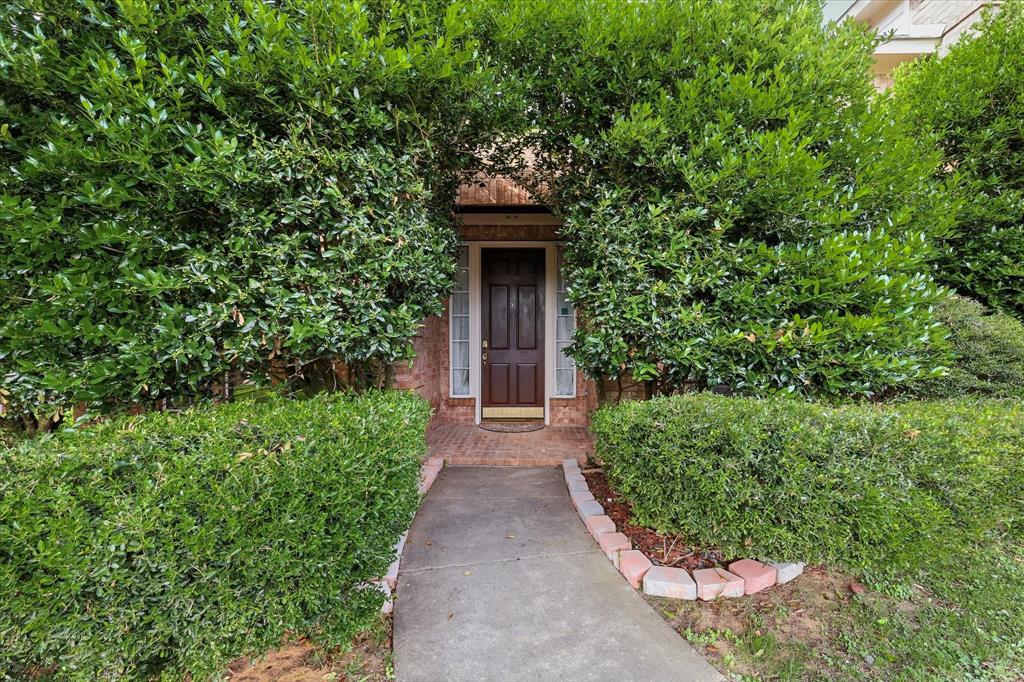 Welcome to this beautifully maintained Northwest Carrollton gem, ideally located in the highly acclaimed Lewisville ISD. Immaculately cared for and thoughtfully designed, this home offers an exceptional blend of comfort, functionality, and energy efficiency.

Step inside to soaring ceilings, abundant natural light, and an open-concept living and dining area that creates an inviting atmosphere for both everyday living and entertaining. The flexible floor plan is perfectly suited for a variety of lifestyles, featuring three first-floor bedrooms, a dedicated office or flex space, and an expansive game room that provides endless possibilities for recreation, hobbies, or a second living area.

Privately situated on the entire second floor, the impressive primary retreat offers a true sanctuary from the rest of the home. This oversized suite features its own stately balcony, creating the perfect place to enjoy morning coffee or unwind at the end of the day. The spacious ensuite bath is designed for comfort and convenience with separate vanities, a large walk-in shower, and an incredible closet, providing exceptional storage and added privacy.

Energy-conscious buyers will appreciate the fully paid-off solar panel system, along with a solar-powered heat pump serving the game room. Car enthusiasts and hobbyists will love the enormous oversized three-car garage, complete with a 220vac plug that supports a Class 2 EV charger, plus an additional two-car carport offering ample covered parking and storage.

Outside, mature landscaping and impressive curb appeal create a warm welcome, while the home's natural color palette provides a timeless backdrop ready for any design style. Combining flexible living spaces, a secluded primary retreat, remarkable garage capacity, and valuable energy-saving features, this exceptional Carrollton home is truly one-of-a-kind. Don't miss this one!