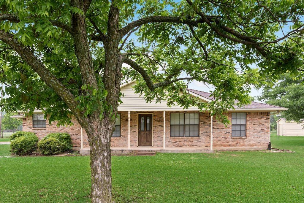 Three pictures have been virtually staged. Come and discover peaceful country living on 4.75 fully fenced acres just a short distance from Dallas and its city amenities!  This beautiful property is a rare jewel, located on a dead-end street, offering privacy and an escape from the hustle and bustle of fast paced living.  Take time to sit back and enjoy the shade from the many mature pecan trees and savor a ripe fig from the fig tree.  The lush grounds offer plenty of space for a large garden and a chicken coop.  The property has a separate fenced area that is perfect for livestock or for another custom home for family.  A large
23 x 21 workshop, complete with electricity, sits directly behind the house and is a perfect place to work on hobbies, store farm equipment, or use as additional garage space.  Attached to the workshop is a spacious covered patio perfect for relaxing or entertaining friends.  It has a cool breeze almost year round.  The interior of the home features thoughtful updates throughout: fresh paint, fully remodeled bathrooms, and an updated kitchen complete with granite countertops, a large breakfast bar, abundant cabinet and counter space, an alcove for a stand up freezer, and recessed lighting.  The living area includes a brick fireplace, built-in desk, and luxury vinyl wood flooring that flows throughout the home.  Don’t miss out on this One Owner little piece of heaven on earth! This listing includes two lots being sold as one property for a total of 4.75 acres. 1638 Easy Street and 1627 Easy Street.
