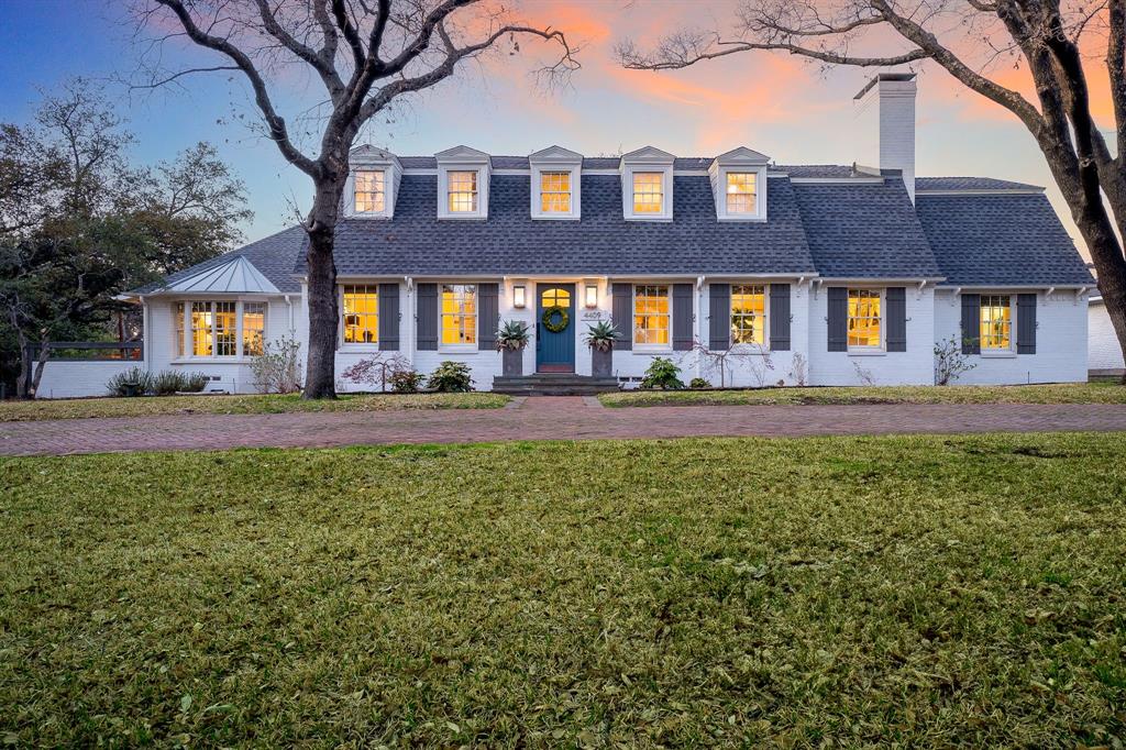 Discover classic Nantucket charm at 4409 Cedarbrush Dr, Dallas. This well kept and updated home offers a blend of timeless style and modern comforts. The heart of the home is a recently renovated kitchen, designed with an English-inspired aesthetic. Shadow Storm Marble slab countertops and backsplashes, an elegant apron-front sink, and floating shelves create a sophisticated yet welcoming space. An Italian workstation sink and bridge faucet add a touch of refined European detail. The primary bath has been thoughtfully updated, featuring a large walk-in shower with polished nickel fixtures, Cumulus Grey Marble tile, and quartz countertops, providing a serene retreat. Designer touches are evident throughout, with exquisite lighting from Visual Comfort and Design Within Reach, and captivating wallcoverings from Schumacher and Thibaut, reflecting impeccable taste. The home boasts 4 bedrooms, with the primary suite conveniently located downstairs, and 3 additional bedrooms upstairs. There are 3 distinct living areas, offering flexible spaces for relaxation and entertainment. For those seeking dedicated workspaces, two separate office spaces provide quiet havens for productivity or creative pursuits. Extend your living space outdoors to an amazing screened-in patio, a true entertainer's delight. This private oasis features an outdoor kitchen and entertainment area, perfect for hosting gatherings or enjoying tranquil evenings. The property also includes a spacious 3-car garage, providing ample storage and convenience. Enjoy two separate yards, one seamlessly connected to the screened-in patio, and another off the kitchen and dining room, ideal for various outdoor activities. Located within a sought-after area, the home is in close proximity to several private schools. A recent roof replacement in 2024 ensures peace of mind for years to come. This property offers a unique blend of elegance, comfort, and convenience, making it a truly exceptional Dallas residence.