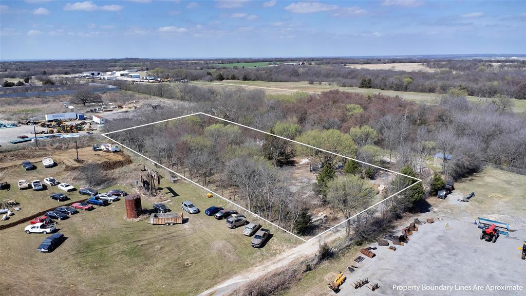 Versatile property located in a commercial and light industrial area with neighboring businesses including Equipment Share and Auto Lec Rebuilders. The lot features a gravel pad or slab suitable for commercial use such as equipment storage, parking, or small business operations.
Certain residential or live-work uses may be permitted subject to city approval. 
This property offers an excellent opportunity for commercial investment, small business operations, or mixed-use development.