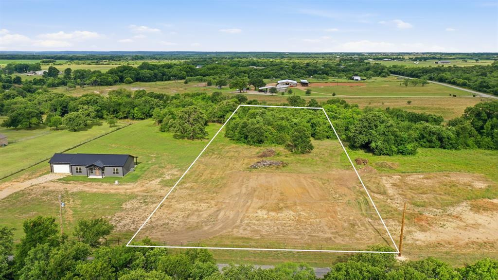 Two acre lot ready for you to build your dream home on in Parker County. Escape the restrictions of city living and enjoy the freedom of country life on this spacious vacant lot located outside the city limits. With a building pad already started and electric available, this property offers a great foundation for your future home.
Enjoy low property taxes, and take advantage of the flexibility that comes with no HOA. The lot is partially fenced and provides plenty of room to create the homestead you’ve always wanted. Livestock are welcome. A well and septic system will need to be installed, allowing you to design the property to fit your needs.
Need a builder?? This property offers the unique opportunity to build with Mule Creek Homes if desired, making the process from lot purchase to move-in even easier.
Whether you’re dreaming of a custom home, a place for your animals, or simply more space to enjoy the outdoors, this property is ready for your vision to become reality.