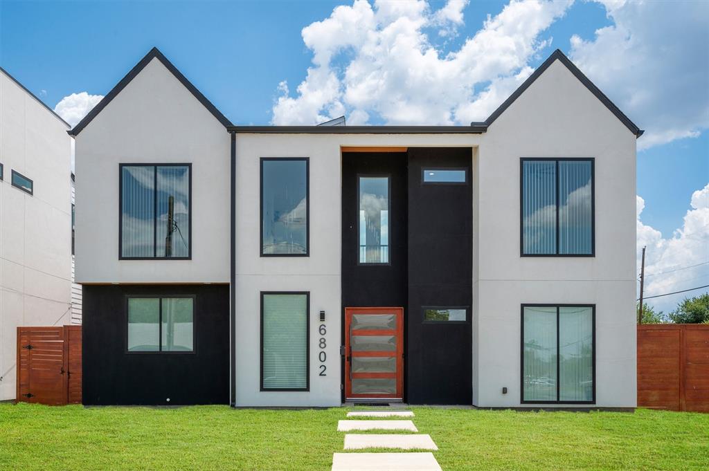 Welcome To 6802 Lockheed Avenue, A Stunning Modern Luxury Home Offering Sophisticated Urban Living Just Minutes From Dallas Love Field, Downtown Dallas, The Medical District, And Premier Dining, Shopping, And Entertainment. Inspired By Scandinavian Design, The Striking Exterior Combines Smooth Stucco, Rich Stained Wood Accents, And More Than 650 Square Feet Of Covered Patio And Balcony Space, Perfect For Entertaining Or Relaxing Outdoors. Inside, You'll Be Captivated By Dramatic 25-Foot Soaring Ceilings, Gorgeous Hardwood Floors, Floor-To-Ceiling Walls Of Glass, Museum-Finish Walls, Floating Staircase, Designer Lighting, And Recessed Lighting Throughout. The Chef's Kitchen Is A Showpiece Featuring Quartz Waterfall Countertops, Custom Low-Profile Cabinetry, Two Sink Workstations, And Commercial-Grade Stainless Steel Appliances. The Luxurious Primary Suite Is A Private Retreat Complete With A Spa-Inspired Bath Featuring A Double Walk-In Shower, Freestanding Soaking Tub, Dual Vanities, And Incredible Custom Closets. A Private First-Floor Guest Suite Is Ideal For Multigenerational Living, Visitors, Or A Home Office. Upstairs Offers Two Spacious Bedroom Suites, Each With A Private Bath, Separated By A Large Loft Living Area That Opens To An Expansive Party Deck Perfect For Entertaining. Situated On A Corner Lot, The Home Also Features A Rear-Entry Garage And Electric Privacy Gate, Delivering The Perfect Blend Of Luxury, Style, Privacy, And Modern Convenience. Property is a Foreclosure Property. Sold As Is. Appraisal on File for $1.1 Million.