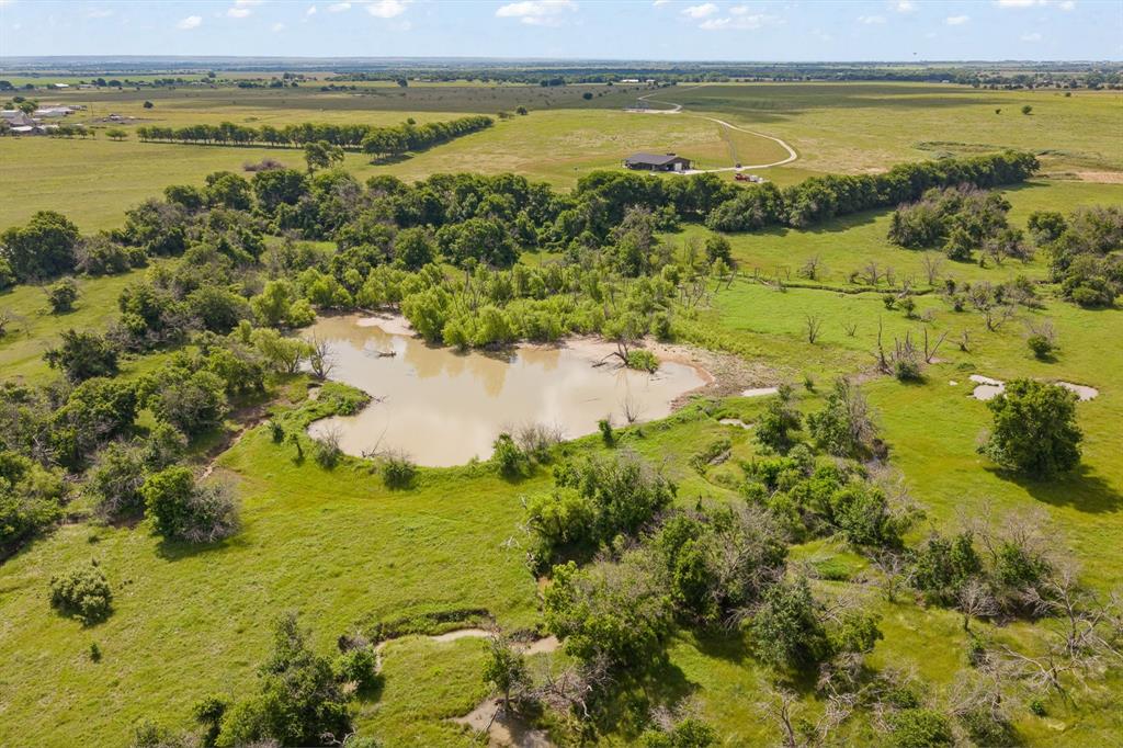 Beautiful 132± acre farm and ranch property located in highly sought-after Grandview ISD. This mostly flat and usable tract is ideal for cattle, hay production, or building your dream ranch home. The land is fenced and cross-fenced and features a scenic duck pond, an additional stock tank, and a seasonal creek along the back of the property, offering excellent water sources and wildlife habitat.

Enjoy peaceful country living with the convenience of nearby highways, the tollway, and shopping just minutes away. With wide-open pasture, multiple water features, and excellent building sites, this versatile property offers endless possibilities for agricultural use, recreation, or long-term investment. A rare opportunity to own quality acreage in a prime location.
