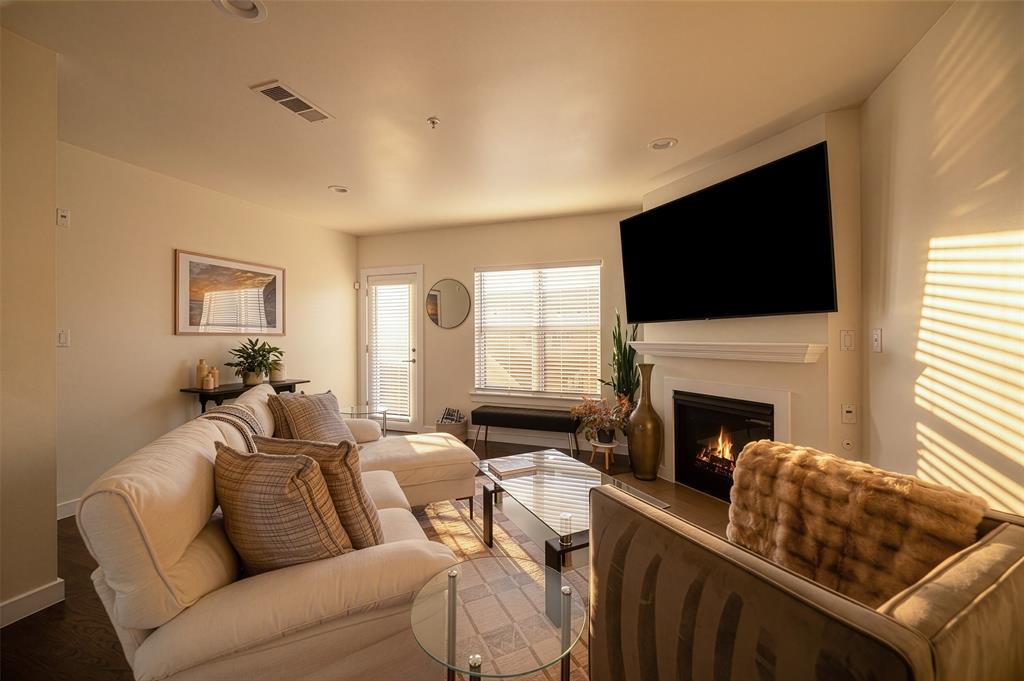 Tucked within a gated community in the heart of Oak Lawn, this beautifully maintained residence lives more like a three-story townhome than a traditional condo—offering an ideal blend of style, functionality, and an unbeatable Dallas location. Bathed in both eastern and western exposure, the home is filled with natural light throughout the day, creating a warm and inviting atmosphere from sunrise to sunset.

Thoughtfully updated and lovingly cared for, the property features extensive improvements including updated flooring throughout, remodeled bathrooms, new granite countertops, custom kitchen backsplash, upgraded handrails and stair detailing, canned lighting, new ceiling fans, and a new HVAC system installed in 2024. The kitchen has been refreshed with updated countertops, a designer aqua backsplash, and a vent hood installed in 2025, while the spacious primary suite offers an updated bath with a remodeled shower, granite countertops, and LED mirror lighting. Additional updates throughout the home create a move-in ready experience that feels both elevated and comfortable.

Rare for the area, the property also includes two dedicated side-by-side parking spaces along with a large private 8x10 locked storage unit—ideal for bikes, seasonal storage, luggage, or additional gear. Residents also enjoy access to a large community dog park, offering the perfect space for pet parents to let their four-legged family members exercise and socialize without ever leaving the neighborhood.

Located just moments from the Katy Trail, Love Field, Uptown, Downtown, and some of Dallas' best restaurants, shopping, and entertainment, this home offers exceptional convenience in one of the city's most walkable and desirable neighborhoods. Perfect for buyers seeking low-maintenance living without sacrificing space, light, or location.