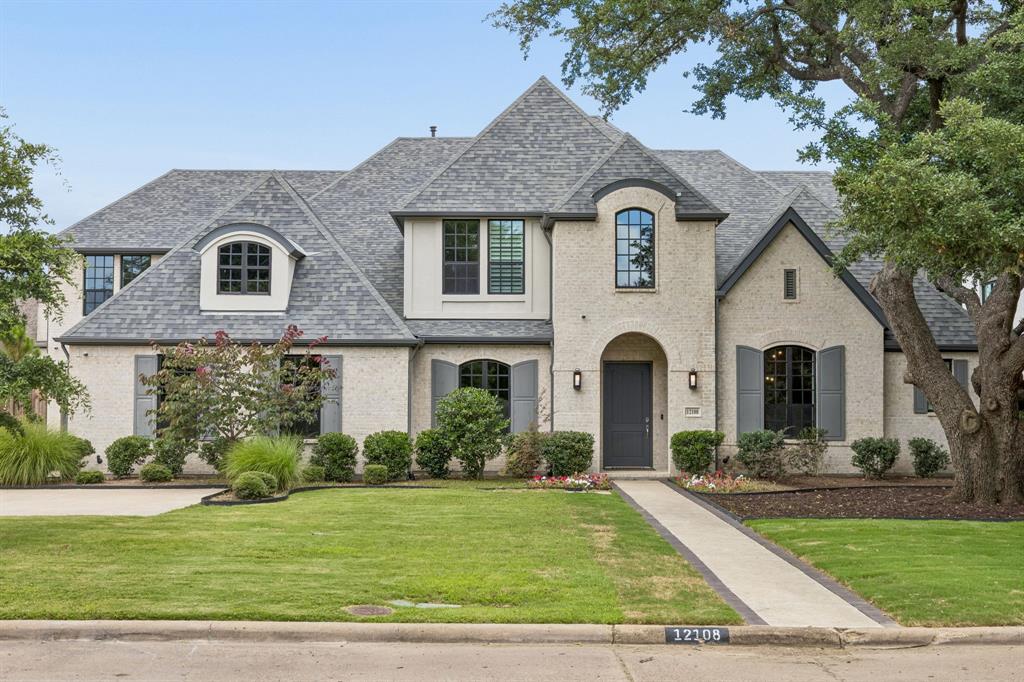 This stunning custom built home that blends refined design with functionality in one of Dallas’ most desirable ares. Thoughtfully designed with most living spaces on the main level, this home offers an ideal layout for both everyday living and elevated entertaining.
Inside, wide-plank wood floors, solid core doors, crown molding, and designer lighting set a sophisticated tone throughout. The private study features elegant wainscoting, stained cedar beams, and a striking chandelier, while the main living area is anchored by a dramatic floor-to-ceiling stone fireplace with cedar beam accents and seamless access to the outdoor living space.
The chef’s kitchen is both beautiful and highly functional, showcasing custom cabinetry, quartz and quartzite countertops, a marble backsplash, and an oversized alder island. Premium appliances include a 48-inch JennAir dual fuel range, built-in KitchenAid refrigerator, warming drawer, microwave, and custom vent hood, all complemented by a large walk-in pantry and under-cabinet lighting.
The main level includes the primary suite, a secondary bedroom, a media room, and a sunroom, while a spacious game room is located upstairs. The primary suite is a true retreat with cedar beam, a spa-inspired bath featuring dual vanities, a freestanding tub, and an expansive walk-in shower with dual rain head. Outdoor living is exceptional, with two rear covered porches and a fully equipped kitchen complete with honed granite countertops, EVO griddle, Memphis smoker, and ample storage. The oversized backyard offers plenty of room for a future pool and is enclosed by an 8-foot board-on-board cedar fence for added privacy. Additional highlights include dual laundry rooms, a full security system, atoms speakers in the media, tankless water heaters, plantation shutters, and an oversized three-car garage with epoxy flooring.
PHOTO OF POOL IS AI RENDERING