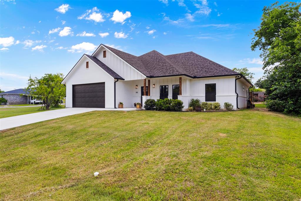 Charming lakeside opportunity at 105 & 107 Runaway Bay Drive in Runaway Bay, Texas! This unique offering includes a beautifully maintained 3-bedroom, 2-bath farmhouse paired with an additional adjoining lot, both being SOLD TOGETHER, providing extra space, flexibility, and potential. Nestled just steps from the lake, this property offers peaceful surroundings, scenic views, and a relaxing lifestyle in a quiet, welcoming community. Whether you’re looking for a full-time residence, weekend retreat, or investment with room to expand, this serene setting delivers the perfect blend of comfort and tranquility.