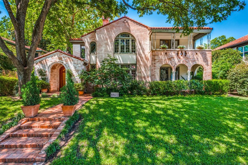'Mediterranean Revival' style home located in the middle of a beautiful block in Highland Park. Originally built in the 1930's as a duplex & attributed to noted architect Vern E. Shanklin, this home effortlessly blends original architectural details with nuanced modern updates. Entrance hall, living room, dining room, updated kitchen with farm sink, La Cornue range, walk-in pantry, powder bath, large den with fireplace & bedroom with ensuite bath. Upstairs has utility room, primary bedroom with updated ensuite bath & private covered porch, 2 beds-baths, & 2 bonus rooms. Walk through the lush, fully-fenced garden to 2 car garage with parking space in the alley. 3rd garage bay & quarters in original condition currently used for storage. As a resident in Highland Park, enjoy access to the town library, community pool, tennis-pickle ball courts. Great location close to DNT & Love Field. Walk to Whole Foods, ride your bike to shops and restaurants on Oak Lawn or HP Village.