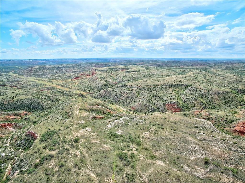 A once in a lifetime opportunity to own the historic Lazy J Ranch encompassing acreage on the North and South of the Canadian River.  This Breathtaking  ±9,546 Acre cattle ranch pastures are full of native buffalo grass and other native plants and grasses.   Explore the beauty of the panoramic elevation changes and wildlife on this scenic piece of history.  A game hunter’s paradise with abundant wildlife, including Desert Mountain Mule Deer, White tailed deer, bobwhite & blue quail, dove, as well as pronghorn antelope.
