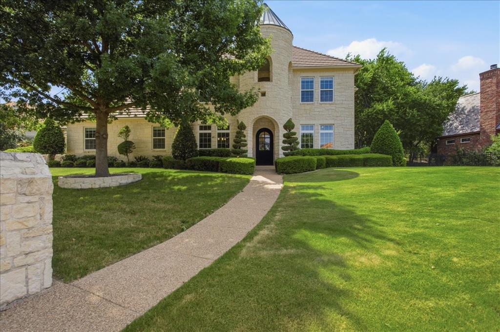 Luxury living awaits in this stunning, completely remodeled Austin stone home, tucked away on a quiet cul-de-sac in the prestigious guarded gated community of Mira Vista. Designed for both everyday living and entertaining, this home features soaring ceilings, rich hardwood floors and an open, light-filled floor plan. A handsome study with custom built-ins welcomes you just off the entry, while the elegant formal dining room connects to a beautifully appointed butler's pantry. The gourmet kitchen is a chef's dream, showcasing a large center island, leathered granite countertops, double ovens, gas cooktop, abundant cabinetry, and seamless flow into the spacious living area. A generously sized laundry room with sink and mudroom off the 3 car garages adds everyday convenience. The luxurious primary suite is a private retreat featuring spa-inspired marble bath and an extraordinary walk-in closet. A guest suite with full bath is located on the first floor as well. Upstairs offers a spacious game room complete with a wet bar, two additional bedrooms with private bathrooms and a large walk-in attic providing exceptional storage. Step outside to an incredible covered patio designed for year-round enjoyment. Featuring a chef's outdoor kitchen, firepit, putting green, and a low maintenance all turf backyard. A truly exceptional home combining timeless elegance, modern luxury, and an unbeatable location in one of Fort Worths premier guarded, gated communities.