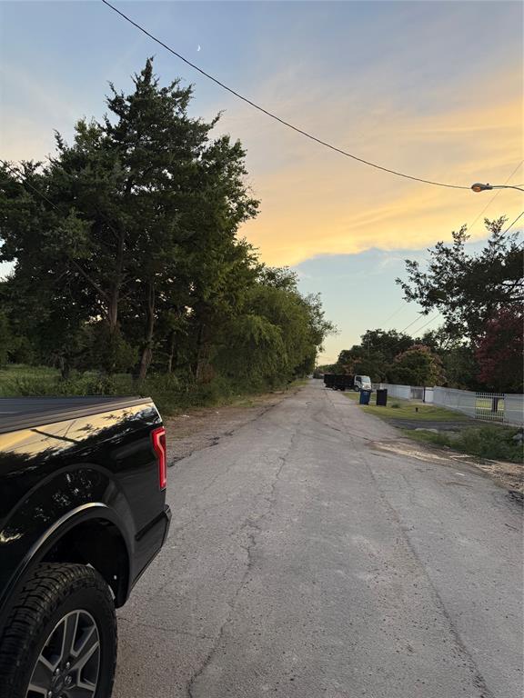 A 5-Acre residential parcel that may be subdivided-replated into new subdivision subject to Dallas Planning & Development setback requirements.  The property has frontage on two streets with a creek. Wherefore, the new site plan may allow for subdivision entry from both sides of the creek - Memory Lane Blvd and Baraboo Dr.