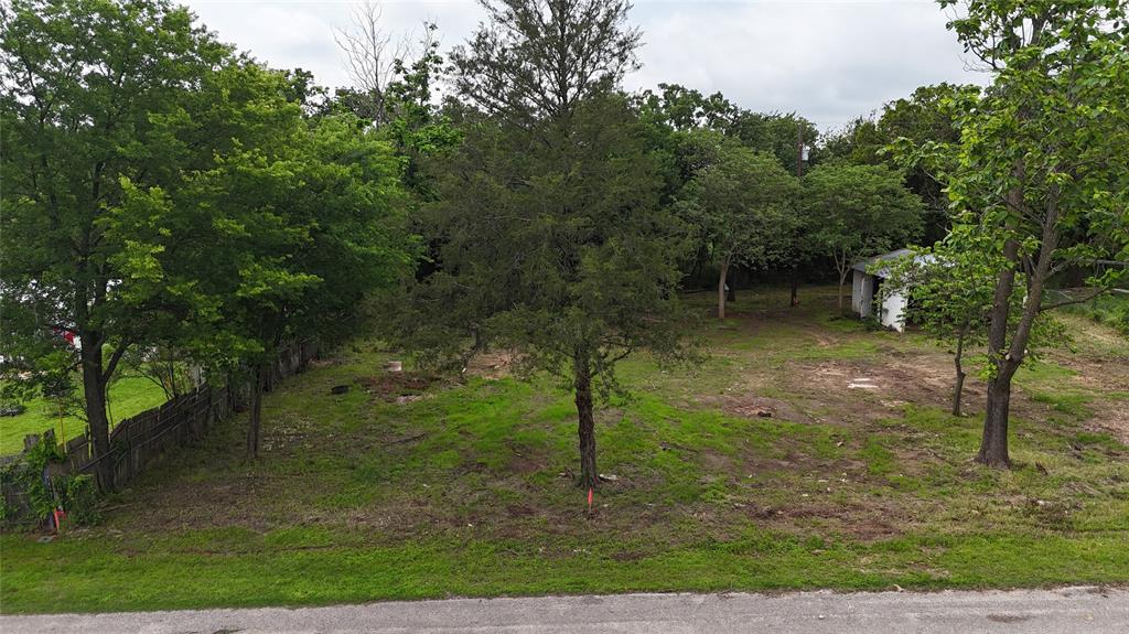 Discover the potential of this versatile property featuring three combined lots, offering ample space for your vision to come to life. With a water tap already on-site and electricity available, much of the groundwork is in place for your future build, investment, or recreational use.

The property includes an existing shop or garage structure ready for renovation—perfect for those looking to add value with a little TLC.

Enjoy the freedom to create without limitations, as there are no known deed restrictions, giving you flexibility for residential, investment, or other uses.

Whether you're looking to build, develop, or hold as an investment, this property presents a rare opportunity with essential utilities and room to grow.