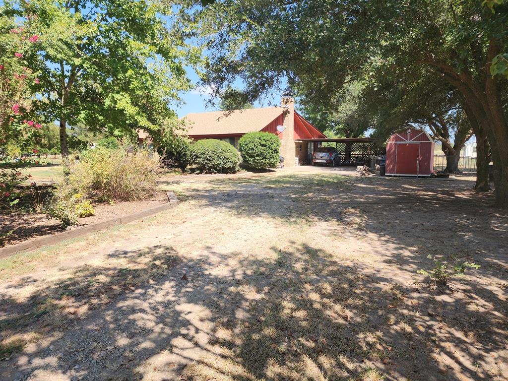 This 1,600sf 3 bedroom, 1.5 baths is nestled amongst ornamental shrubs and trees which offers peace and tranquility. BUT
WAIT THERE IS MORE although the property is only 1.0 acre it has been home for up to two horses and now one Mustang
claims it as home today. The property features an area for livestock, small hay barn with two stalls and a tack room,
equipment shed, fenced in back yard and a separate pet area. The home has a open floor plan with french doors open up to
the sun room which looks out to the landscaped back yard and the home of the mustang.