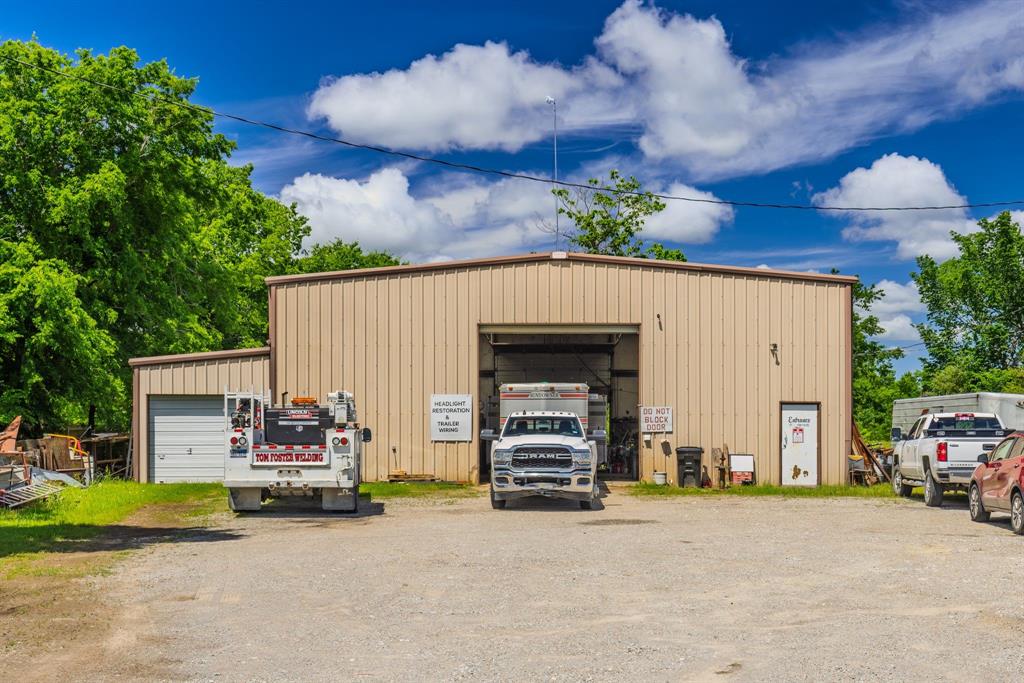 MOTIVATED SELLER!  After 40 + years of developing a profitable, high demand business, TOM FOSTER WELDING & REPAIR SHOP is for Sale!!  Shop, Business Name, Equipment, Inventory.  Welding shop area is 62' X 50' ft, 3100 sq ft, 24' interior height, slab foundation with 20' X 20' area, reinforced with 5' thick concrete for heavy equipment and machinery, Insulated and Florescent Lighting.  There are two 14' roll up doors. 3 phase power is available. Attached to the shop area, you will find 600 sq ft of storage area and a one-half bath. All Inventory, Welding Equipment, Drills, Bits, and tools will convey with the property. Examples of the Equipment, Tools and Inventory included are:  300 Gal Air Compressor, 3 Drills, 80 Ton Press, Generator, Heliarc Welder, Wire Welder, 2 additional Welders, ~100k Welding Rods, 3 shop Fans, Band Saw, Air Jack for Diesel 18 Wheeler, 3000 lb Work Table, Wood Burning Furnace, 1500 lb Layout Table, 4 Grinders, Chop Saws, Multiple Jack Stands, sockets, Wrenches, clamps, Multiple Benches, Storage Bins, Containers, Steel Fireproof Safe, Multiple Iron pieces, and much more.  There is a Storage Container outside.   After approximately 47 years of welding services, such as: Fencing, gates, repairing heavy equipment for farm and ranch, oil fields, etc.:  TOM FOSTER'S name and business is highly recognizable in and has earned substantial Goodwill!  Property includes a 2 bed, 1 bath home, approximately 800 sq ft, one car attached carport. Separate utilities, septic and 911 address.  Long time tenant in place and would like to remain in the home. Don't miss the opportunity to own this established business and property!