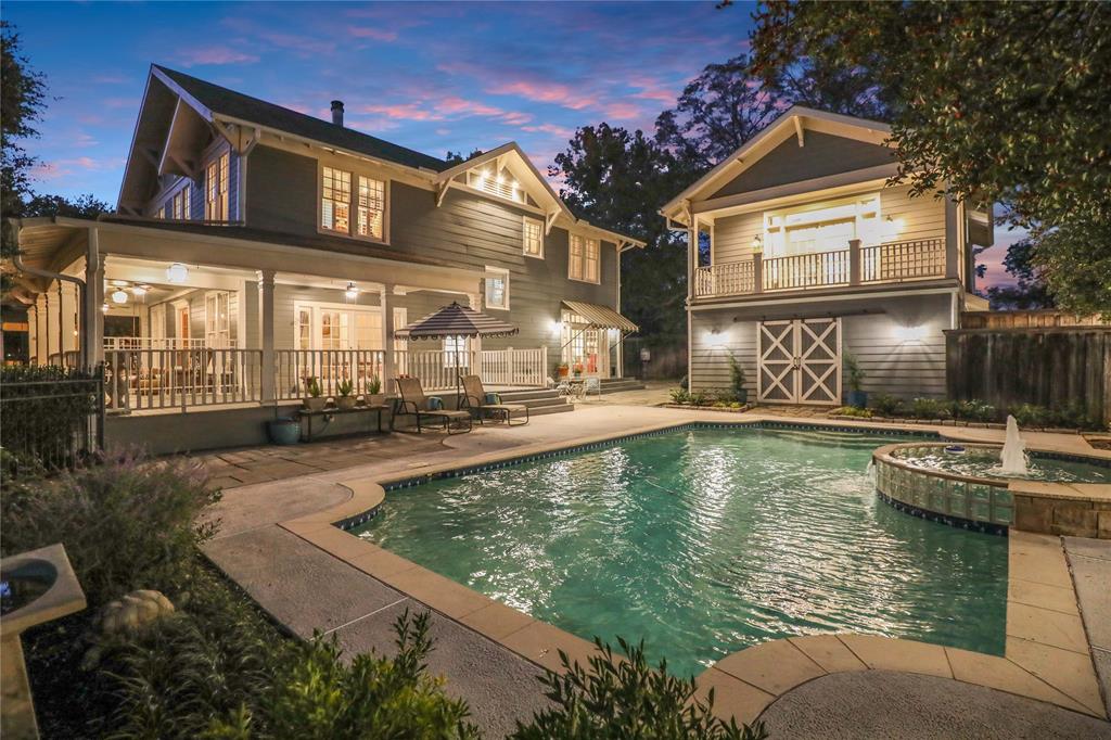 HISTORIC MCKINNEY's JACKSON-ATKINSON house, built in 1914, has been beautifully renovated and is situated on one of McKinney's most desirable streets: 1204 Tucker Street. The corner lot provides an expansive front yard and a newly constructed (2023) 730 sq.ft. oversized, detached garage facing the side street. A 600 sq.ft. CARRIAGE HOUSE is situated atop the garage, featuring a balcony overlooking the pool and courtyard. A rebuilt and widened walkway, constructed with reclaimed red bricks, leads to the inviting wrap-around porch and front door. The recently remodeled interior boasts a designer kitchen ideal for entertaining, complete with a large center island, ample cabinet storage, and Carrara Marble countertops. It includes a Bertazzoni 5-burner cooktop convection oven and vent hood, a large farmhouse sink and faucet, custom ceiling-high kitchen cabinets with inset lighting, and a spacious walk-in pantry. Additionally, there is a cozy sitting area off the kitchen and French doors that lead to the side porch and a tranquil POOL with spa. Both the primary and downstairs bathrooms have also been beautifully remodeled with Carrara Marble tile floors, showers, and countertops. This two-story craftsman home, despite renovations, retains its original character. It features original pine and oak floors, craftsman-style door knobs, solid 5-panel doors, exposed shiplap, antique chandeliers, and custom crown molding and baseboards. New gas lines and plumbing were installed between 2018 and 2019. French drains were added around the exterior of the house in 2025. There are a lot more surprises, so be sure to review the 2-page List of Remodels, Upgrades & Improvements available in MLS documents! We also have a History Report on the house and printed floor plans for the main house, garage, and carriage house. The popular Downtown Square, with its shopping, dining, art galleries, and seasonal events, is conveniently located and easily accessible by foot, bicycle, or golf cart.
