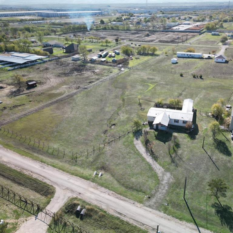 Welcome to 18014 Tydings Rd, where rural charm meets unlimited possibilities. This 4-bedroom, 2-bathroom home sits on a spacious 2.47-acre lot in the heart of Justin, TX. Enjoy the freedom and privacy of country living with plenty of room for outdoor activities, future expansion, or redevelopment.
With no zoning restrictions, this property opens the door to a wide range of uses—ideal for truck parking, a mechanic shop, warehouse space, or other business ventures. Whether you're looking to invest, live, or develop, this property offers flexibility and long-term potential.