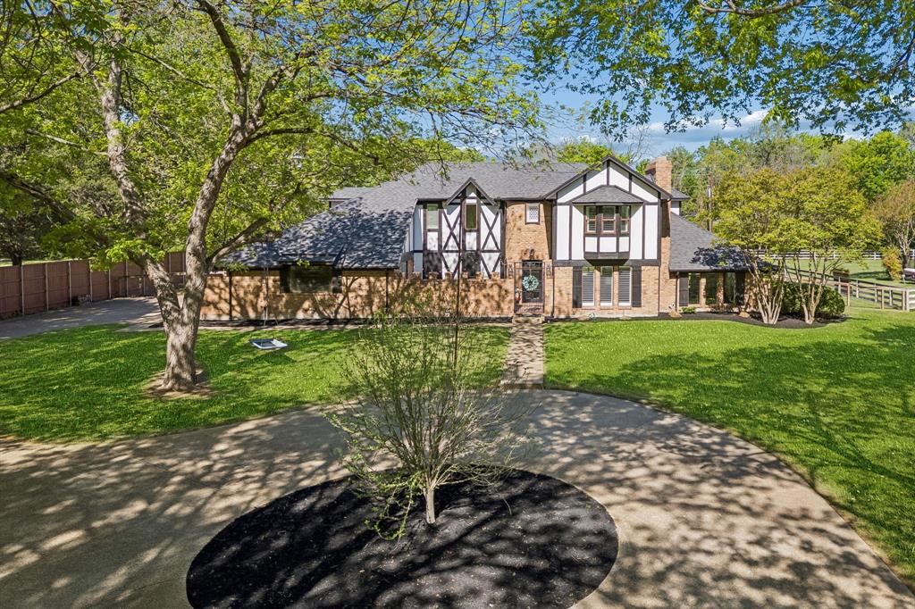 Nestled on a heavily treed 1.1 acre lot in the heart of Fairview, this home offers a blend of charm, comfort, and relaxed living. Oozing with character and coziness, she has 4 bedrooms, 3.1 baths and is zoned for highly acclaimed Lovejoy ISD.  She is move-in ready, but also has some untapped potential for anyone who is looking to put their own stamp on her.  Recent updates include the totally renovated kitchen with honed quartzite counters, Bosch appliances, electric induction range, brick flooring, reverse osmosis system, dining room built-ins, electric panels, switches and hardware, water heater, and pool pump. Our favorite features include the turret entry with lead glass window, staircase with wall lighting, the family room with wood clad ceiling, the front courtyard, the brick flooring and gorgeous setting! Her location is ideal for walking to Sloan Creek Intermediate and is within minutes of all retail, restaurants and major highways. We encourage you to drive the neighborhood, Foxglen, as there are so many unique homes with mature landscapes and great curb appeal. SELLER is offering a $25K credit towards rate buydown, closing costs, and home improvements.