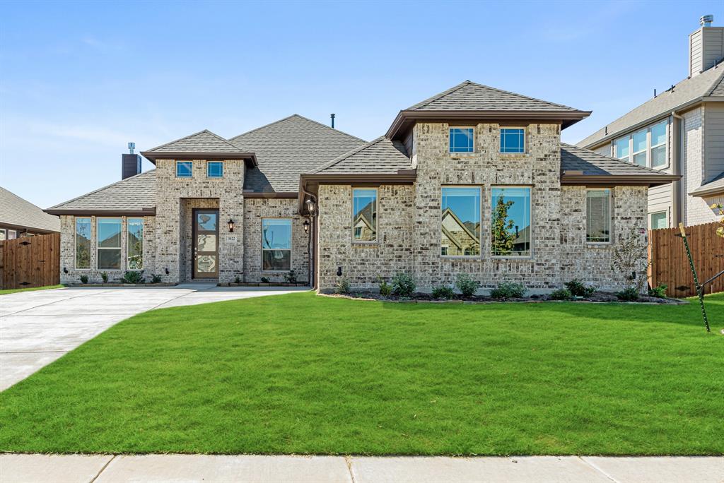 New Construction ready to close immediately! This Rockcress is a show-stopping Bloomfield J-Swing home with a beautiful, modern brick exterior lined with picture windows, covered porch, cedar garage door, and a stately 8' front door. Everything you want including an open common space featuring a Deluxe Kitchen & Tile-to-ceiling Fireplace, a spacious Study, and indoor-outdoor living from a sliding glass door connected to the large Covered Back Patio! The Deluxe Kitchen is made for entertaining friends & family...hosts custom cabinets with pot & pan drawers, Granite countertops, built-in appliances (including a gas cooktop), a wood vent hood, an extensive island, and a great walk-in pantry. Roomy secondary bedrooms and the Primary Suite is tucked away in the back of the home with backyard views. Mud Room with laundry off the garage, energy-efficient features, 2in Faux Wood Blinds, and Rain Gutters included! Stop by Bloomfield's model in Parkside North to explore all this home offers.