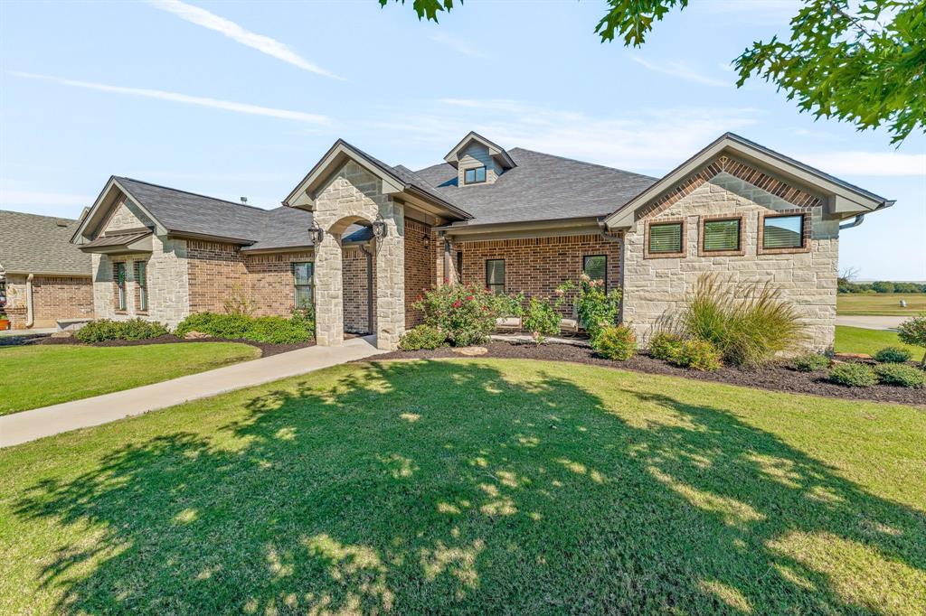 Beautiful Custom Home! Check this one out!! This is a 2019 custom built home by Brian Kilgore Construction!! He is undoubtedly one of the very most respected builders in our area! The home features a beautiful, open concept living room, dining room and kitchen! The home has 4 bedrooms, 2 full baths and 1 half bath upstairs! There is a second living area upstairs that could be an additional bedroom, game room, movie room, or even a class room if your kids are home schooled! There is also an oversized 3 car garage with side entry driveway! There is a ton of parking around the home, plenty of room to park multiple cars or even a truck and trailer! The back yard is so beautiful, with a beautiful back porch area that is shaded in the evening! The yard is completely fenced for your pets! This home is the complete package, with beautiful high end finishes, a fantastic floor plan, oversized garage for all your toys, and located right on the golf course! Come take a look quickly, as this type of home doesn't come along very often!!