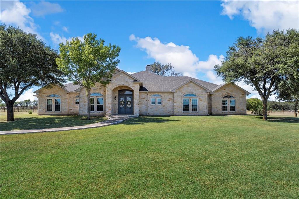 This 127-acre estate in Axtell ISD boasts impressive features, including a grand entry with double gates, three spacious bedrooms, and three bathrooms. The expansive land is beautifully manicured, featuring FOUR large stocked ponds and a stunning cover of oak trees.

The huge kitchen is perfect for cooking enthusiasts, offering ample cabinet space and storage. The property also includes a water filtration system and a central vacuum for added convenience. The separate master suite with a walk-through shower adds a touch of luxury, while the large back porch with an outdoor grill is perfect for entertaining.

Additionally, the enormous workshop with multiple roll-up doors provides plenty of space for projects, and the 640 sq ft shop apartment can serve as a man cave or office space. With just a short 15-minute drive to Waco for shopping and dining, this property combines rural charm with convenient access to urban amenities. Plus, the adjacent 85 acres available for sale adds even more potential!