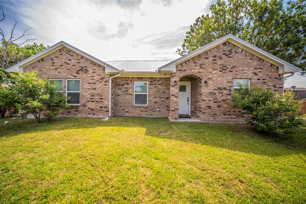 Welcome Home!! 3 bed 2 bath home on 1.2 acres in walking distance to the middle, high school, and city park was built in 2019. The Back yard has covered patio 14x8 and is fenced and ready for pets or farm animals with two sheds one is brand new 16x20. The shop is 24x26 with power. Inside granite counters and luxury plank vinyl with 11 ft vaulted ceiling in the living room with plenty of windows for natural light. The Primary suite is large enough for sitting area. The bathroom has a with large walk in closet, cultured marble counters with a shower that has a bench for convenience. To go along with the metal roof the home has spray foam insulation and insulation on the interior walls to help keep energy costs down and reduce noise.