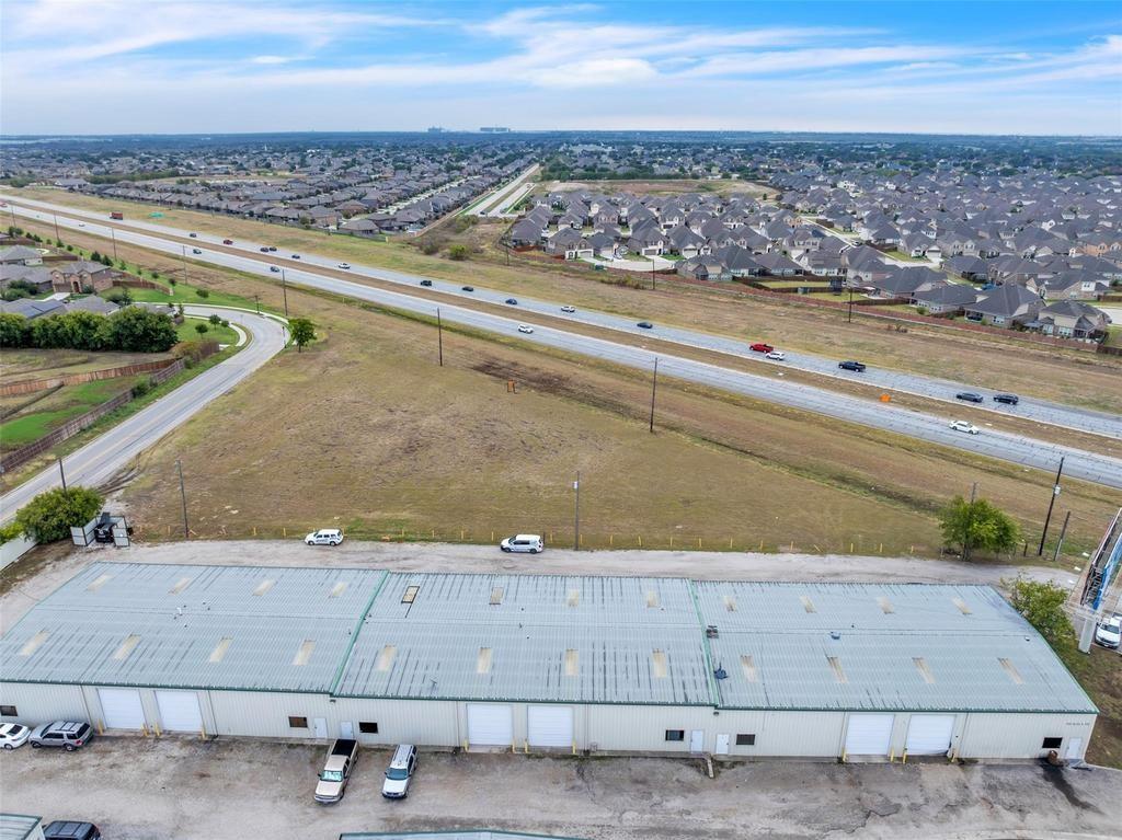 Over 500’ of highway frontage provides unparalleled visibility for your business, making it an ideal location for entrepreneurs and investors alike.
Water, Electric, and Internet utilities are already on site, saving you time and money on infrastructure development.
This land is available for just about any use. Zoned by the city of Fort Worth to be the maximum of industrial J and acceptable to any commercial business lighter than industrial J, the possibilities are endless. Whether you're looking to establish a manufacturing facility, a retail store, or a service-based business, this property offers the flexibility to accommodate your needs.
Build up to a 20,000 SF building, perfectly laid out to be a great location for a gas station, car wash, storage facility, mechanic shop, gym, or any other small business headquarters that would enjoy the growth of 50-70 thousand cars passing by daily. Endless exposure making your business and attractive option for customers and clients!
Local businesses pay $2000-6000 a month just for a billboard on the highway. Make your building's location your new billboard with this prime highway frontage location. With the constant flow of traffic, you'll be able to reach a wider audience and increase brand awareness without the hefty advertising costs. The Tx. plans are already designed and ready for the construction of the new access roads connecting this property to the highway and the thousands of homes on this side of the highway. This infrastructure development will not only enhance the property's accessibility but also increase its value.
The appraised value of this land will undoubtedly increase with these access improvements. Reserve it now for the future growth of your business and prime investment opportunity. Don't miss out on the chance to establish a thriving business in a rapidly growing area.