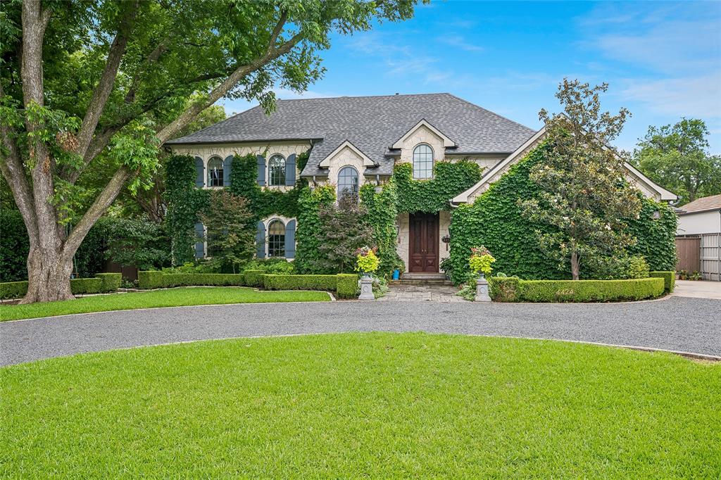 Located in the heart of Dallas’ prestigious Preston Hollow neighborhood, The home offers an ideal balance of luxury, comfort, and functionality, making it perfectly suited for both everyday living and grand-scale entertaining.
From the moment you enter, the home showcases exquisite craftsmanship with rich hardwood floors, high ceilings, custom millwork, arched passageways, and designer finishes throughout. Expansive living spaces are filled with natural light and thoughtfully designed to create a warm yet refined atmosphere. The formal living and dining areas flow seamlessly into inviting family spaces, offering versatility for gatherings of any size.
At the center of the home is a chef-inspired gourmet kitchen featuring premium appliances, custom cabinetry, generous prep space, and an oversized island ideal for entertaining. Multiple ovens, high-end finishes, and open sightlines to the living areas create a space that is as functional as it is beautiful. A richly appointed study with custom wood detailing provides the perfect private office or library retreat.
The spacious primary suite serves as a luxurious sanctuary, complete with a spa-like bath, expansive walk-in closets, and serene views of the beautifully landscaped grounds. Additional bedrooms are generously sized, offering comfort and privacy.
Designed for indoor-outdoor living, the backyard retreat offers peaceful surroundings with mature landscaping. Ample space for relaxation or future enhancements. The home also features the added convenience and peace of mind of a whole-house generator, ensuring uninterrupted comfort and reliability year-round.
Every element of the property reflects thoughtful design and elevated living. Situated on one of Preston Hollow’s most desirable streets, with close proximity to Dallas’ finest private schools, premier shopping, upscale dining, and convenient access to major thoroughfares, all while maintaining the privacy and prestige of an established luxury neighborhood.