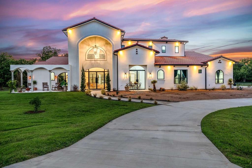 Stunning Mediterranean estate on 4.37 acres with private creek, equestrian & walking trails, and a resort-style pool and spa. Welcome to 4501 Yucca Flats Trail — a private retreat in Fort Worth’s scenic countryside. This 5,109 sq ft custom home offers 6 bedrooms, 4.5 baths, a media room, large home office and a fully mirrored gym. Designed with entertaining in mind, the open-concept floor plan flows seamlessly into a show-stopping outdoor oasis. The expansive resort-style patio showcases a full outdoor kitchen, covered living area, and a spectacular oversized pool — perfect for gatherings or private relaxation. Beyond the backyard, explore your own creek and wooded trails perfect for walking or horseback riding. Includes 3-car garage, high-end finishes, 3 AC units, private well and a rare blend of privacy and convenience near shopping, dining, and highways. Built in 2023, this estate delivers the best of Texas living.
