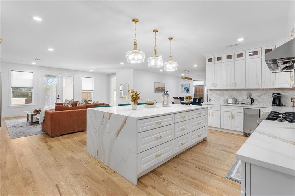 The Home You’ve Been Waiting For — Now at the Right Price!!!

Tucked in the coveted pocket between Bluff view and Greenway Parks, this 4,130 sq. ft. contemporary estate is one of the most compelling values in Dallas right now — and the numbers back it up. This is the kind of home that checks every box: white oak hardwoods, soaring ceilings, and an open-concept layout designed for the way people actually live today. The chef’s kitchen is built to impress — Forno 8-burner range, Sub-Zero refrigeration, and a custom wine showroom that doubles as a conversation piece. Whether you’re hosting a dinner party or a quiet night in, this kitchen delivers.

The 75209 zip code does the heavy lifting on lifestyle. Walk to the dining and shopping of University Park and Highland Park. Top-rated exemplary schools are minutes away. Love Field makes travel effortless. And the neighborhood itself — one of Dallas’s best-kept secrets — gives you the prestige of Park Cities proximity without the Park Cities price tag.
Privacy matters here too. The lot is secured by a 9-foot high-security fence, the backyard is genuinely quiet and spacious, and the outdoor patio and built-in grill make it an entertainer’s retreat. Smart home technology is fully integrated throughout.
This is a turn-key residence with zero compromises, now priced as the best value-per-square-foot for a luxury urban estate in this corridor.

If you’ve seen it before, this is your moment. If you haven’t — don’t wait.
Schedule your private showing today. Please let me know if you have any question.
