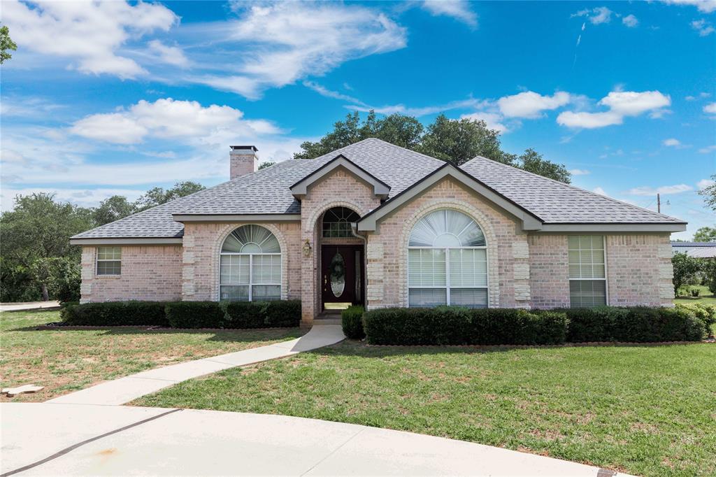 Welcome home to this beautifully maintained property nestled on an expansive 1.4-acre triple lot in the highly sought-after Early ISD. Built in 2000 and offering 2,247 square feet, this immaculate 4-bedroom, 2.5-bathroom home combines timeless appeal with a peaceful charm of country-style living. From the moment you arrive, you'll appreciate the exceptional curb appeal, mature shade trees, and pride of ownership that is evident throughout. Inside, you'll find a spacious, well-cared-for floor plan designed for comfortable everyday living and effortless entertaining. Step outside to your own private retreat where a serene, tree-covered backyard and inviting patio create the perfect setting for morning coffee, evening gatherings, or simply enjoying the tranquility of nature. Green thumbs will love the established vegetable garden, while hobbyists and outdoor enthusiasts will appreciate the additional storage workshop, carports, and abundant space for equipment, boats, or recreational vehicles. For added peace of mind, the property also features a storm shelter, attached two-car garage, and plenty of room to spread out on this rare triple-lot property. If you've been searching for a home that offers space, functionality, and meticulous care in one of the area's most desirable school districts, 131 Mitsy Lane is a must-see.