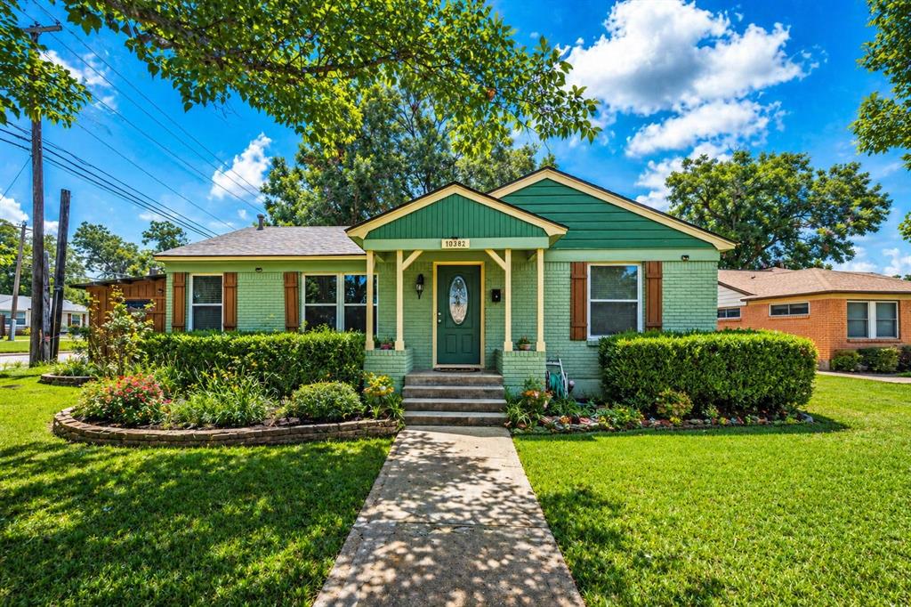 Rare opportunity to own a charming home on a sprawling quarter-acre corner lot just minutes from White Rock Lake. Situated on approximately a quarter acre, this beautifully maintained property offers a unique combination of privacy, outdoor living, and secure parking that is increasingly difficult to find in East Dallas.

A fully automated gated entrance welcomes you to an expansive driveway with rear alley access, providing ample room for RV, boat, trailer, or additional vehicle parking. The detached 2-car garage and storage building add exceptional functionality, while the mature trees and lush landscaping create a peaceful retreat from the city. An inviting courtyard and outdoor sitting area provide the perfect setting for relaxing or entertaining family and friends.

Inside, you'll find warm and inviting living spaces filled with character and natural light. The open living and dining areas flow seamlessly into a spacious kitchen featuring solid surface countertops, abundant cabinetry, a walk-in pantry, and views of the beautifully landscaped backyard. The primary bedroom showcases charming knotty pine accents and a walk-in closet, while the spacious secondary bedroom offers flexibility for guests, a home office, or creative space. The renovated bathroom features custom tile work, pebble stone flooring, and an insulated soaking tub designed for relaxation.

Conveniently located near White Rock Lake, parks, trails, shopping, dining, and entertainment, this property offers the perfect balance of tranquility and accessibility. If you're searching for a home with character, privacy, a large lot, and hard-to-find gated parking for your toys and vehicles, this East Dallas gem deserves a closer look.