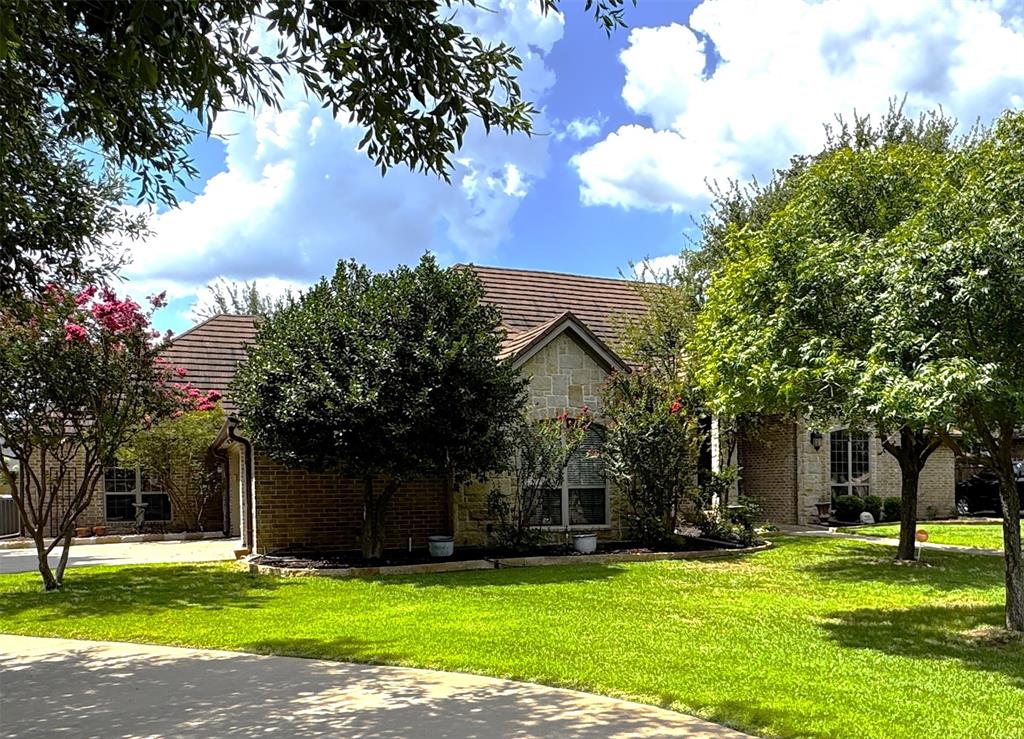 MOTIVATED SELLER!!! 
Bright, Inviting, and Move-In Ready in Gated Timber Cove!

Welcome to this beautifully refreshed home in the desirable, gated Timber Cove community—now featuring ALL NEW interior paint, creating a bright, inviting atmosphere throughout. This spacious layout offers three generously sized bedrooms, each with its own walk-in closet, plus an open-concept living area enhanced by custom built-ins and abundant natural light.

Enjoy both formal dining and a charming breakfast nook, giving you flexible spaces for everyday living and entertaining. The gourmet island kitchen includes granite countertops, custom cabinetry, and plenty of room for cooking and gathering.

A large secondary family room sits near the guest bedrooms, making it an ideal playroom, media room, or quiet retreat. The private primary suite features a luxurious bath and an attached office with dual access—perfect for working from home, a nursery, a library, or even a potential fourth bedroom.

Step outside to the screened-in back porch, a peaceful spot for outdoor dining or relaxing. Additional features include a three-car garage and dedicated RV parking, offering exceptional storage and convenience.

Timber Cove is a lakeside community with its own private boat ramp to Lake Granbury, giving you easy access for boating, fishing, and fun lake days.