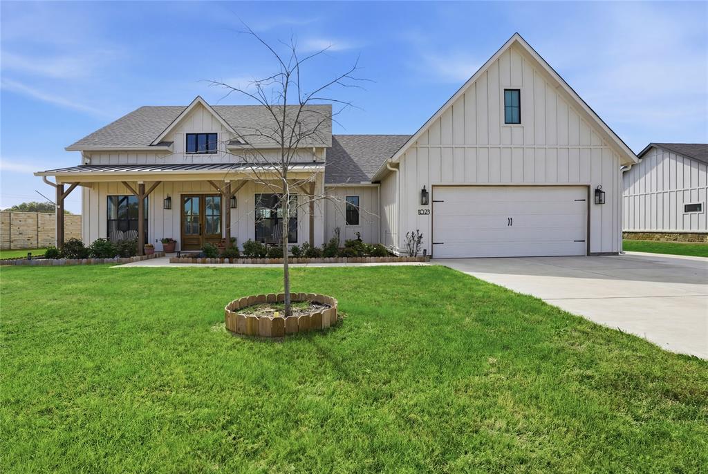 Experience the perfect blend of modern farmhouse style and functional luxury in this stunning home. Featuring a split-bedroom floor plan and an expansive upstairs bonus room that is currently being used as a fourth bedroom, this layout is an ideal setup for multigenerational living, offering maximum privacy for everyone.
The heart of the home is a gourmet kitchen boasting 10' ceilings, a massive walk-in butler pantry hidden by a designer barn door, and a large prep island with seating. It flows seamlessly into a great room anchored by a classic brick fireplace with gas logs. Retreat to the private master wing, featuring a freestanding tub and separate shower, while guests or family enjoy the opposite wing with a Jack-and-Jill bath. Oversized laundry room that is connected to the primary walk in closet for added convenience. Car enthusiasts or multi-vehicle families will love the oversized garage with epoxy flooring, room for up to 4 cars, dedicated storage area plus the extended driveway for additional parking. All this on a lush half-acre with storage shed in the acclaimed Glen Rose ISD!