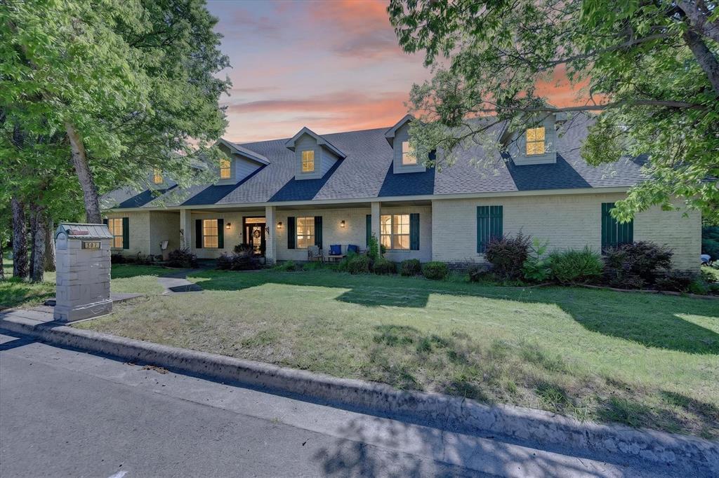 Unique custom home just blocks from the historic Decatur Square on a beautifully treed lot. Offering 4 bedrooms, 4.5 bathrooms, and an incredibly versatile floorplan, this home features spacious secondary bedrooms, each with a private en-suite bath, and an oversized primary suite with a massive walk-in closet, attached office or sitting area, and a hidden room tucked behind a custom bookcase. All bedrooms are conveniently located on the main level, with only the game room upstairs. The chef's kitchen is designed for both everyday living and entertaining with double ovens, abundant storage, and plenty of workspace. Multiple living areas include a front library or den and a large family room with flexible gathering spaces to accommodate a variety of lifestyles. Upstairs, a huge game room or bonus room is accessible by both stairs and a private elevator from the garage, creating endless possibilities for a media room, hobby space, guest retreat, or multi-generational living setup. The oversized 4-car garage includes a 2-car bay currently configured as a home gym, plus a separate storage room providing even more space for tools, seasonal items, hobbies, or extra equipment. Outside, enjoy expansive front and back porches, mature trees, exceptional privacy, and extensive driveway space with room for RV, boat, or additional vehicle parking. A rare opportunity to own a one-of-a-kind property combining space, flexibility, and an unbeatable location near downtown Decatur.