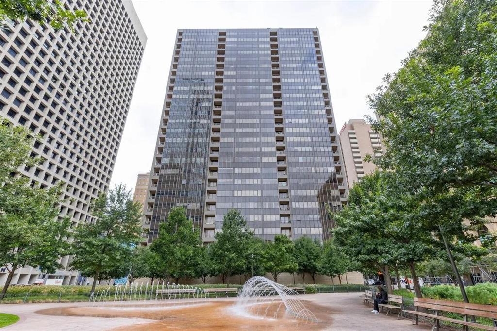 BACK ON MARKET DUE TO BUYER UNABLE TO REMOVE THEIR HOME SALE CONTINGENCY. Welcome to the Metropolitan.  A completely remodeled high rise located in the heart of Downtown Dallas!  The unit is on the 9th floor offering a fabulous open floor plan and generous rooms sizes.  The unit looks and shows modern!  Automated blackout shades, wood waterproof flooring & LED lighting throughout, updated kitchen with white cabinetry & recently added (less than 5 years) black stainless appliances, spa-like bath with custom lighted mirror, AT&T Fiber, & one assigned garage space.  As you enter the unit, you are welcomed with a nice comfortable kitchen with black granite countertops.  A breakfast leads to the living area overlooking the city skyline and park below.  Bedroom to the left along with utility room and ultra-modern bath room.  Building amenities include a security guard and desk at front lobby, community home theater, conf. room, fitness center, pool, community lounge, & green space with grill area.