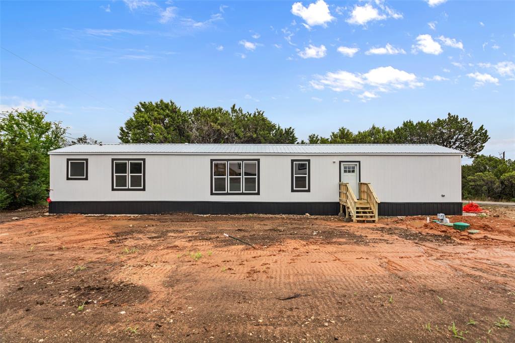 Experience modern living in this brand new Jessup 3 bed, 2 bath mobile home, located in a desirable Granbury neighborhood. This home, complete with its own lot, features top-of-the-line, energy-efficient design, stainless steel appliances, and an abundance of natural light. Enjoy spacious bedrooms, a luxurious master bath, and the added benefit of a neighborhood with a boat ramp and parks, perfect for family enjoyment. This one won't last long! Book your showing today! Owner Financing Available!